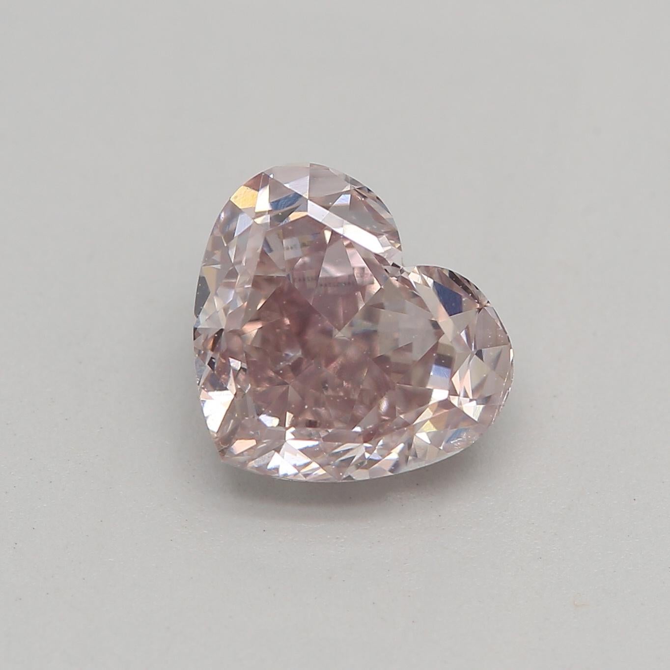 Certificate: GIA 
Report Number: 7441522443
Shape And Cut: Heart
Carat Weight: 1.02 carat
Measurements: 5.69 x 6.57 x 3.62 mm
Color Grade: Fancy Brownish Pink 

FEATURES OF THE DIAMOND:

This Fancy Brownish Pink diamond is a rare and unique diamond