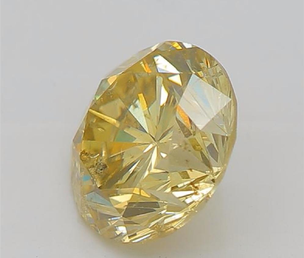 Taille ronde Diamant fantaisie jaune brun clair de 1,02 carat de pureté SI2 certifié par le GIA en vente