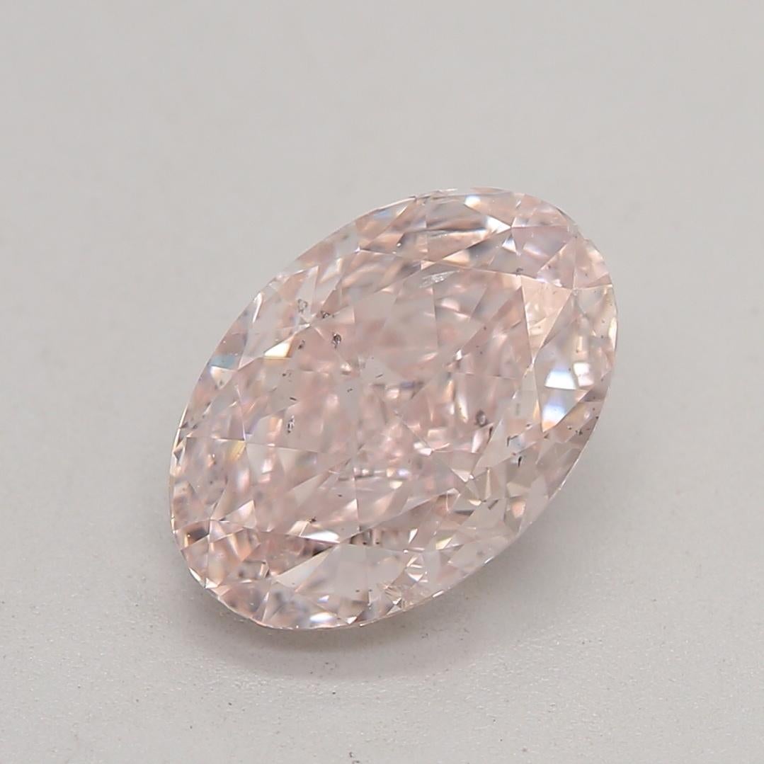 Certificat : GIA 
Numéro de rapport : 7383844803
Forme et coupe : Ovale
Poids en carats : 1.02 carat
Dimensions : 7,46 x 5,11 x 3,35 mm
Grade de couleur : Rose orangé clair fantaisie

CARACTÉRISTIQUES DU DIAMANT :

Ce diamant Fancy Light Orangy Pink