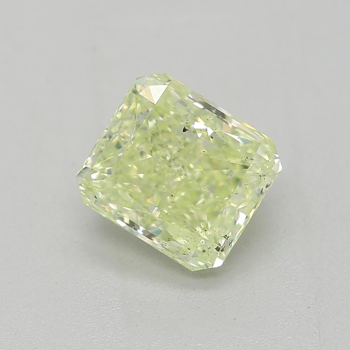 Certificate: GIA
Report Number: 2474888329
Shape And Cut: Radiant
Carat Weight: 1.02 carat
Measurements: 5.69 x 5.15 x 3.57 mm
Color Grade: Fancy Yellow Green

This fancy yellow-green diamond is a rare and exquisite diamond prized for its unique