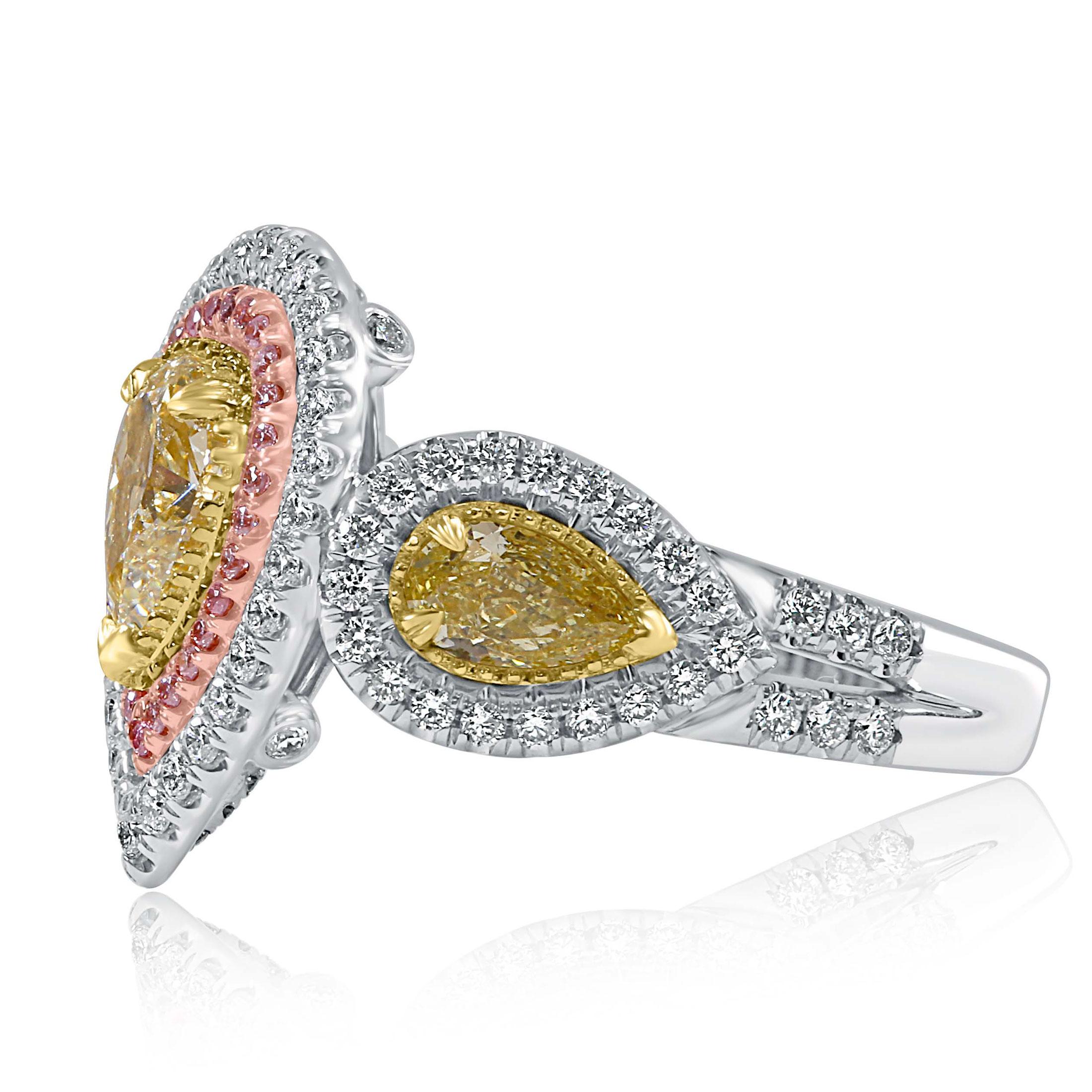 This stunning engagement ring is a true masterpiece, showcasing a 1.02-carat GIA-certified pear-shaped brilliant cut diamond at its heart. With a light yellow hue and VVS2 clarity, this exquisite center stone measures 7.73 x 5.16 x 3.52 mm,