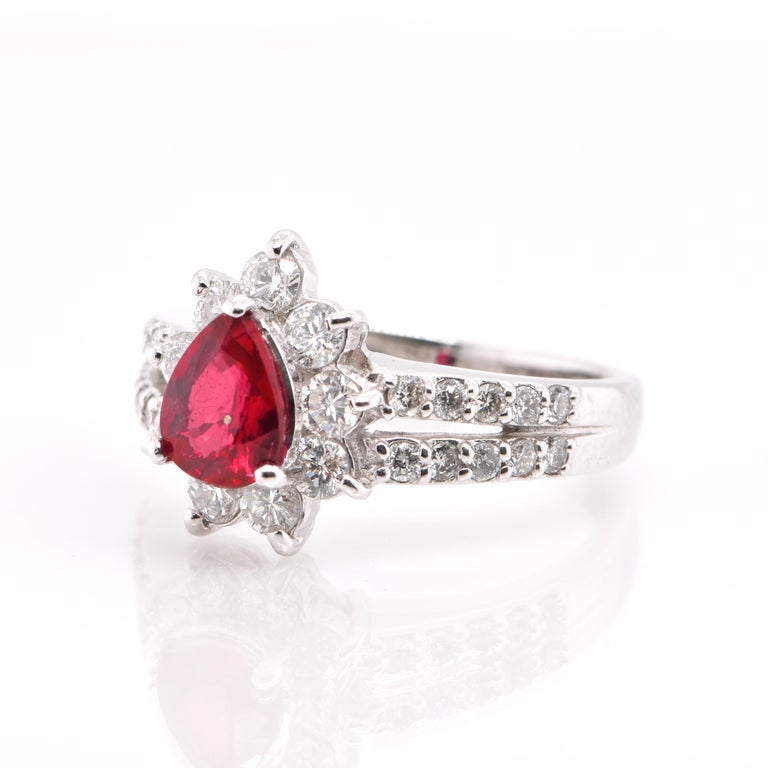 A beautiful Ring featuring a GIA Certified 1.02 Carat Natural, Untreated (No Heat) Ruby and 0.85 Carats of Diamond Accents set in Platinum. Rubies are referred to as 