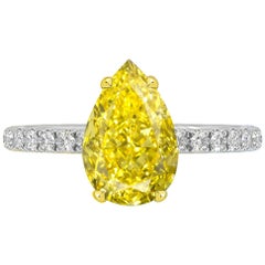 GIA Certified 1.02 Carat Pear Shape Fancy Vivid Yellow Diamond Ring