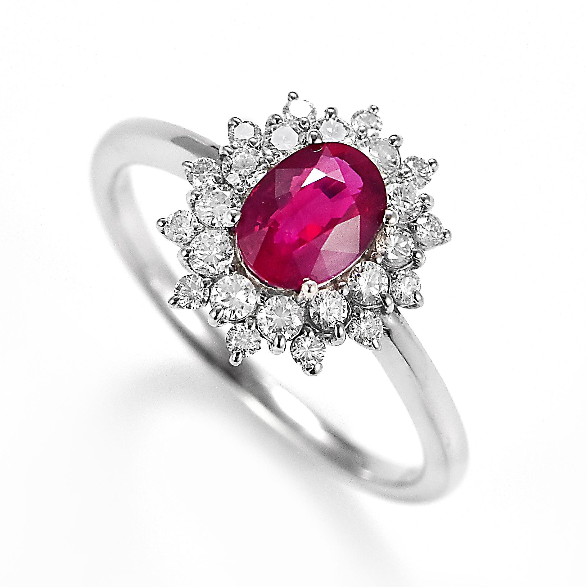 A beautiful Ring set in Platinum featuring a GIA Certified 1.02 Carat Natural Untreated, Burmese Ruby and 0.37 Carat Diamonds. Rubies are referred to as 