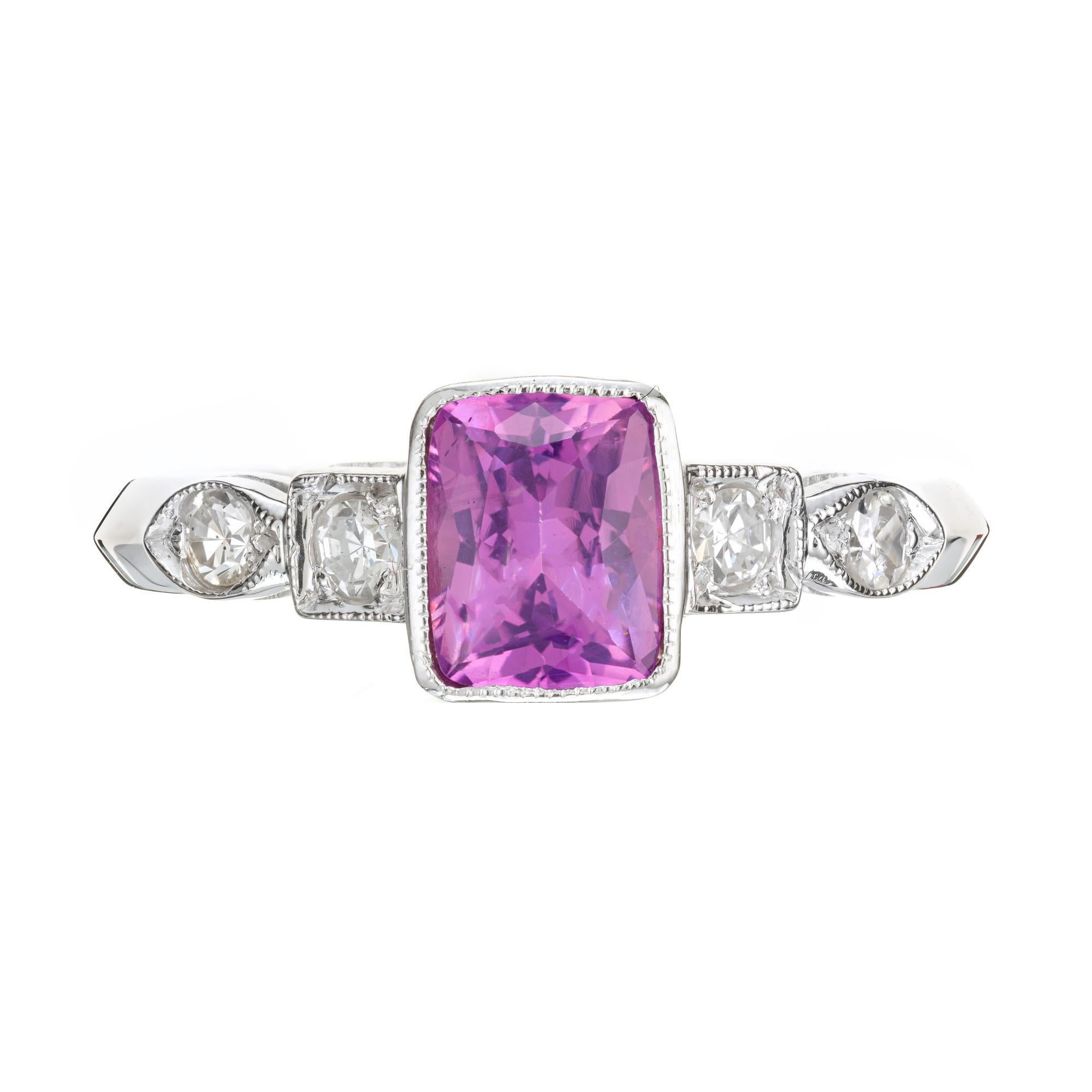 1920's Art Deco sapphire and diamond engagement ring. GIA Pink cushion cut sapphire center stone in a Milgrain platinum setting with 2 single cut diamonds on each side. The sapphire is natural and untreated. 

1 cushion cut pink purple Sapphire,