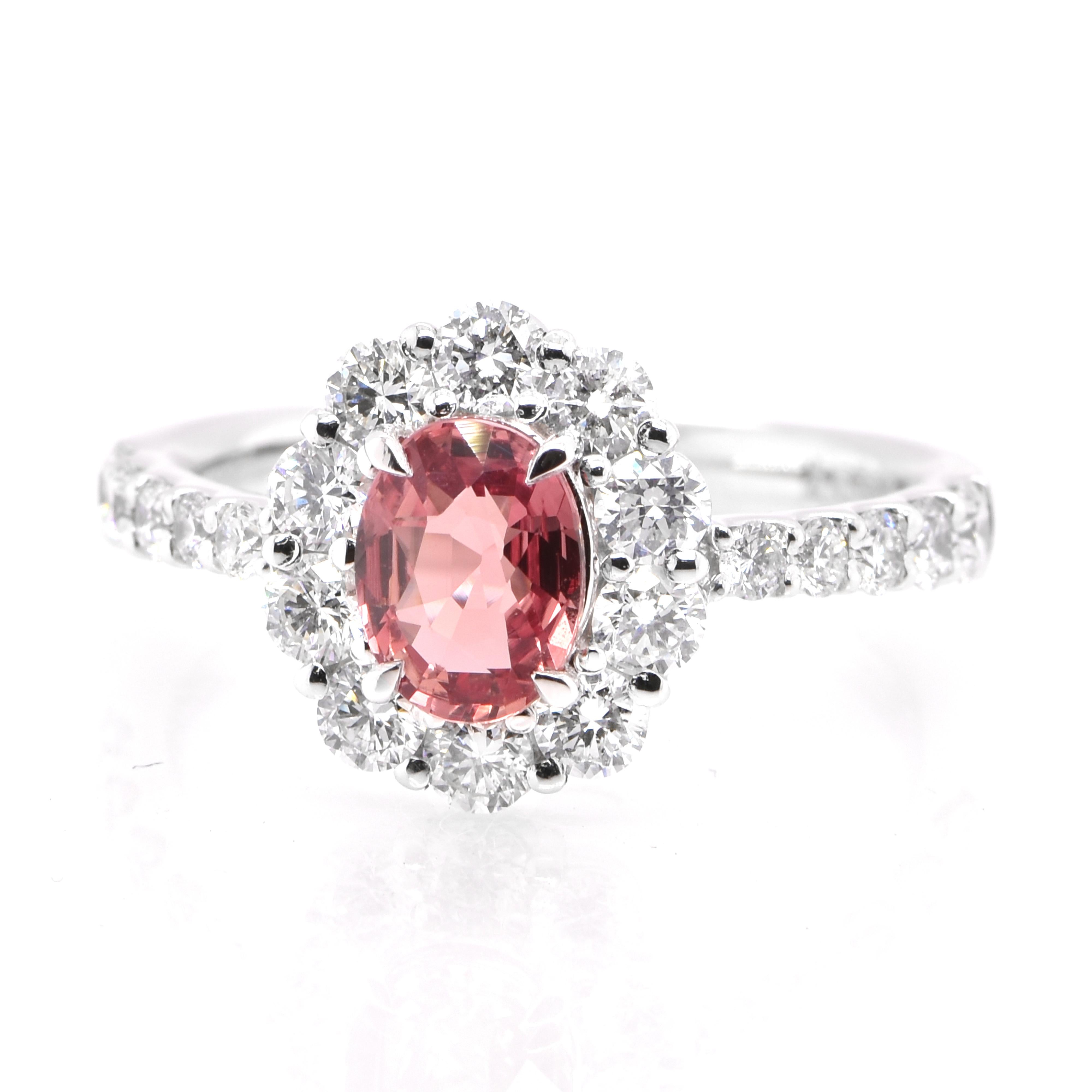 A beautiful ring featuring GIA Certified 1.02 Carat Natural, UnheatedPadparadscha Sapphire and 0.97 Carats of Diamond Accents set in Platinum. Sapphires have extraordinary durability - they excel in hardness as well as toughness and durability