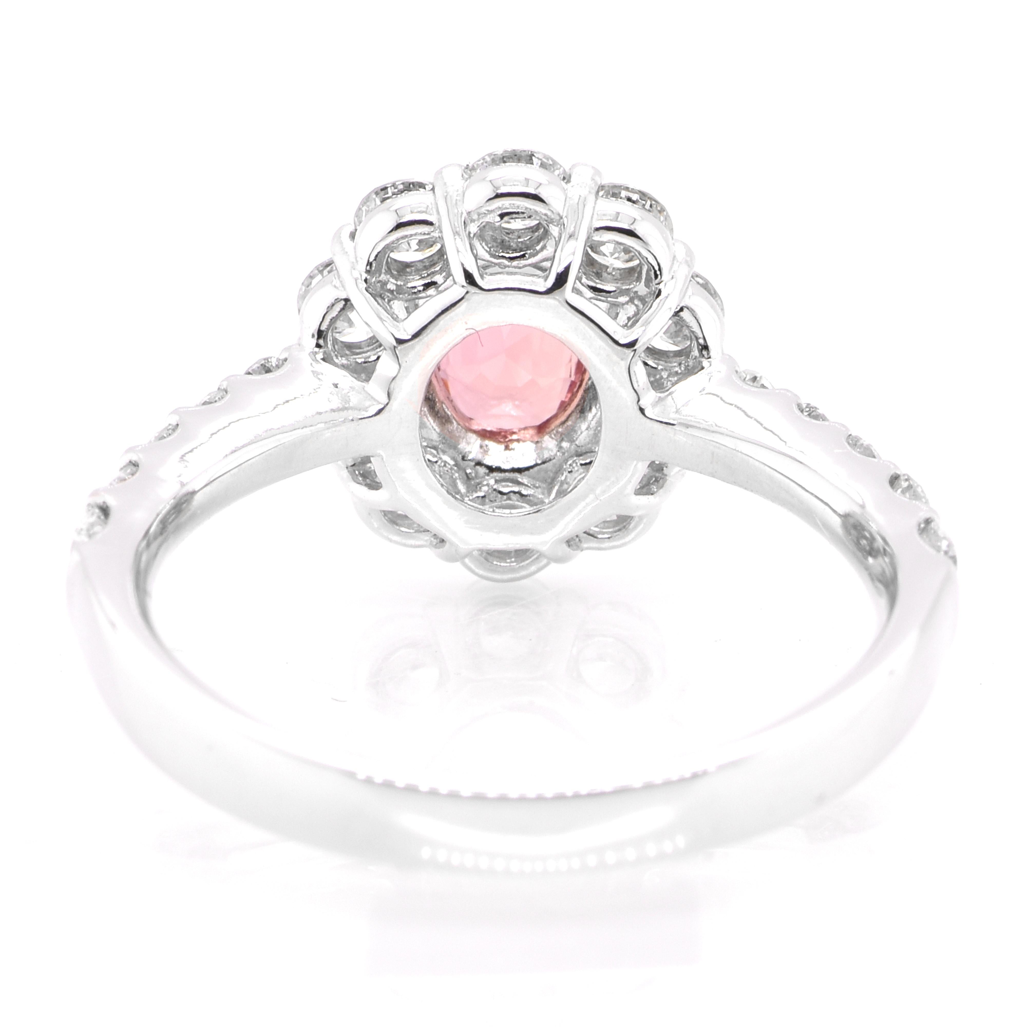 Modern GIA Certified 1.02 Carat, Unheated Padparadscha Sapphire Ring set in Platinum For Sale