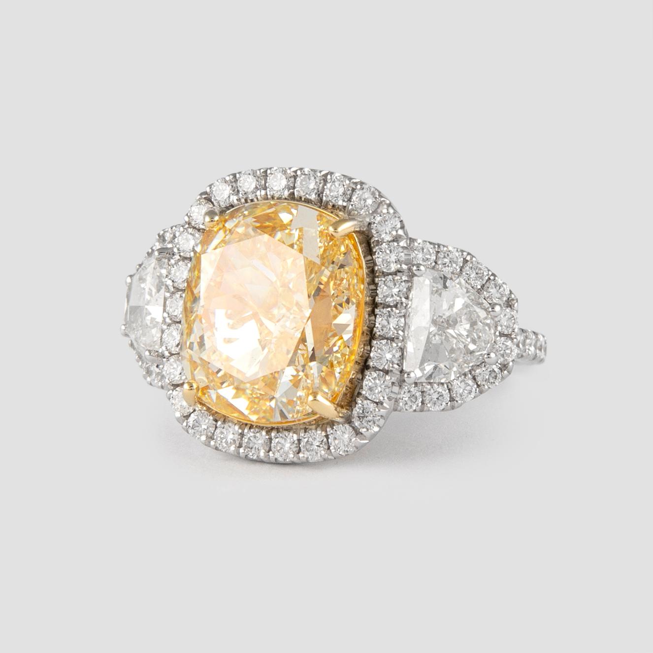 Alexander GIA Certified 10.25ct Fancy Yellow Diamond Three Stone Halo Ring 18k  In New Condition In BEVERLY HILLS, CA