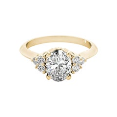 GIA Certified 1,02ct Oval Solitaire & Cluster 3-Stone Diamond Ring