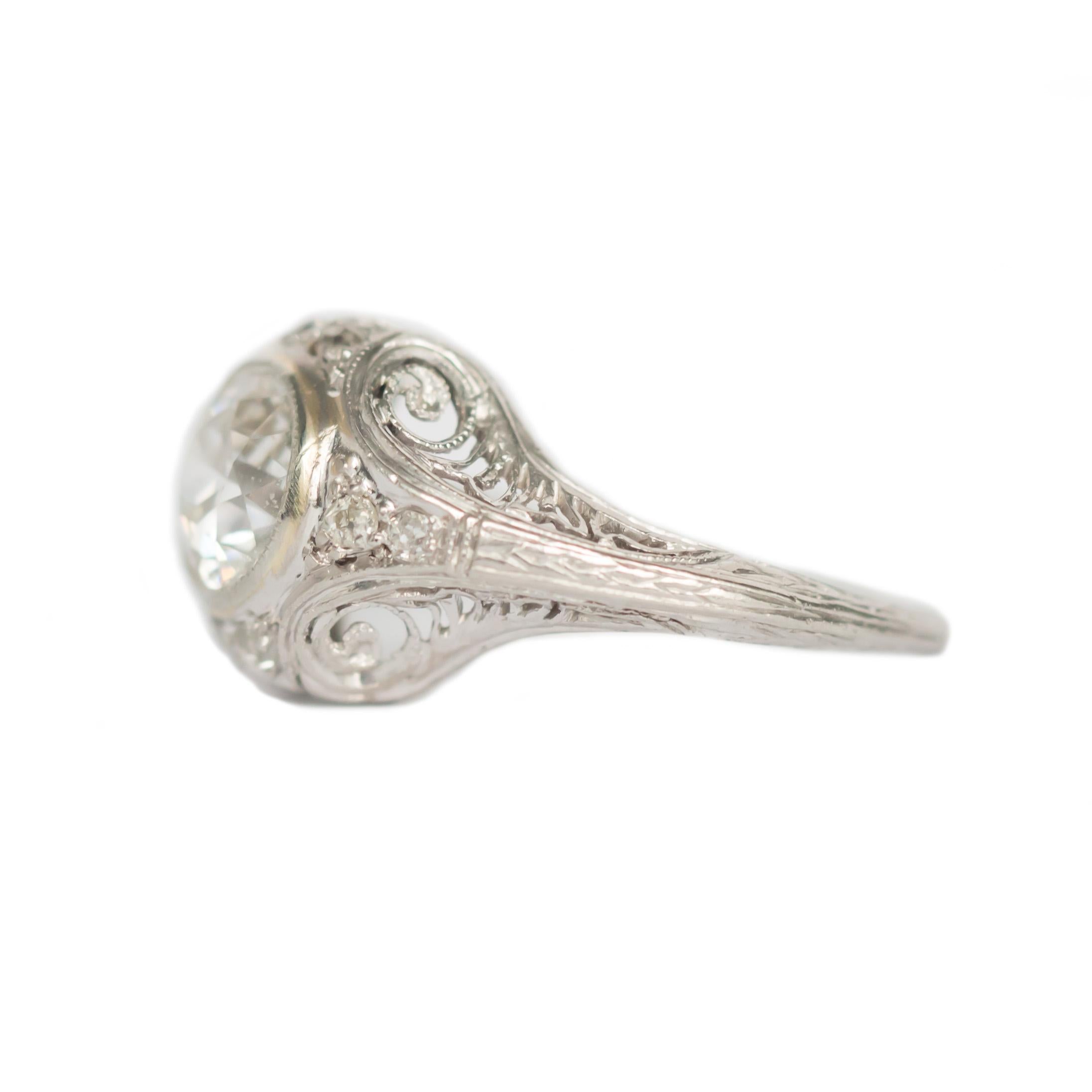 Ring Size: 5
Metal Type: Platinum
Weight: 3.6 grams

Center Diamond Details
Shape: Old European Brilliant 
Carat Weight: 1.03 carat
Color: J
Clarity: I1

Side Stone Details: 
Shape: Antique European Cut 
Total Carat Weight: .15 carat, total