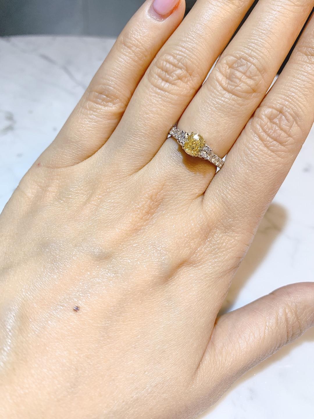 GIA Certified 1.03 Carat Fancy Yellow VS1 3-Stone Diamond Ring For Sale 2