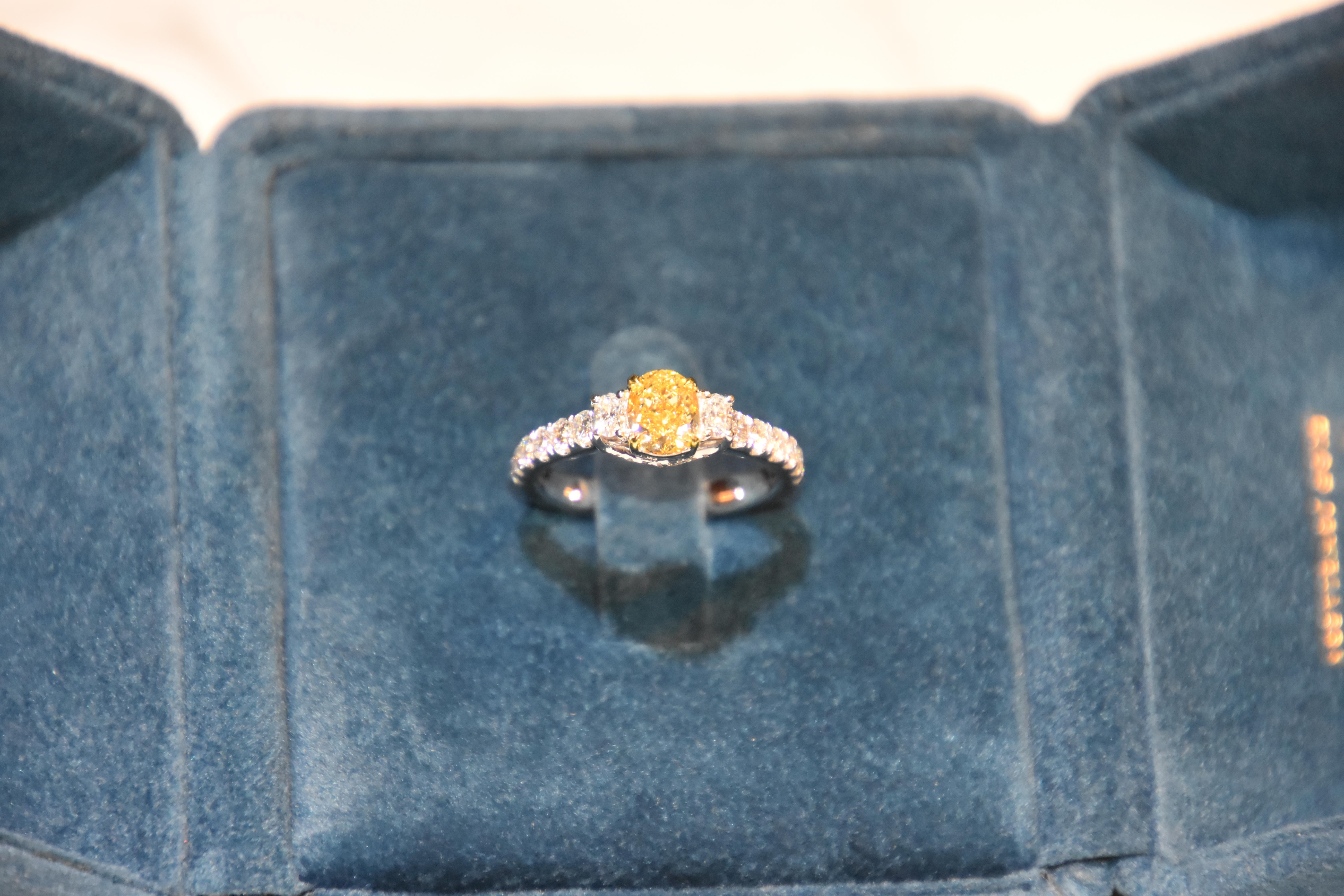 GIA Certified 1.03 Carat Fancy Yellow VS1 3-Stone Diamond Ring In New Condition For Sale In Tsim Sha Tsui, HK