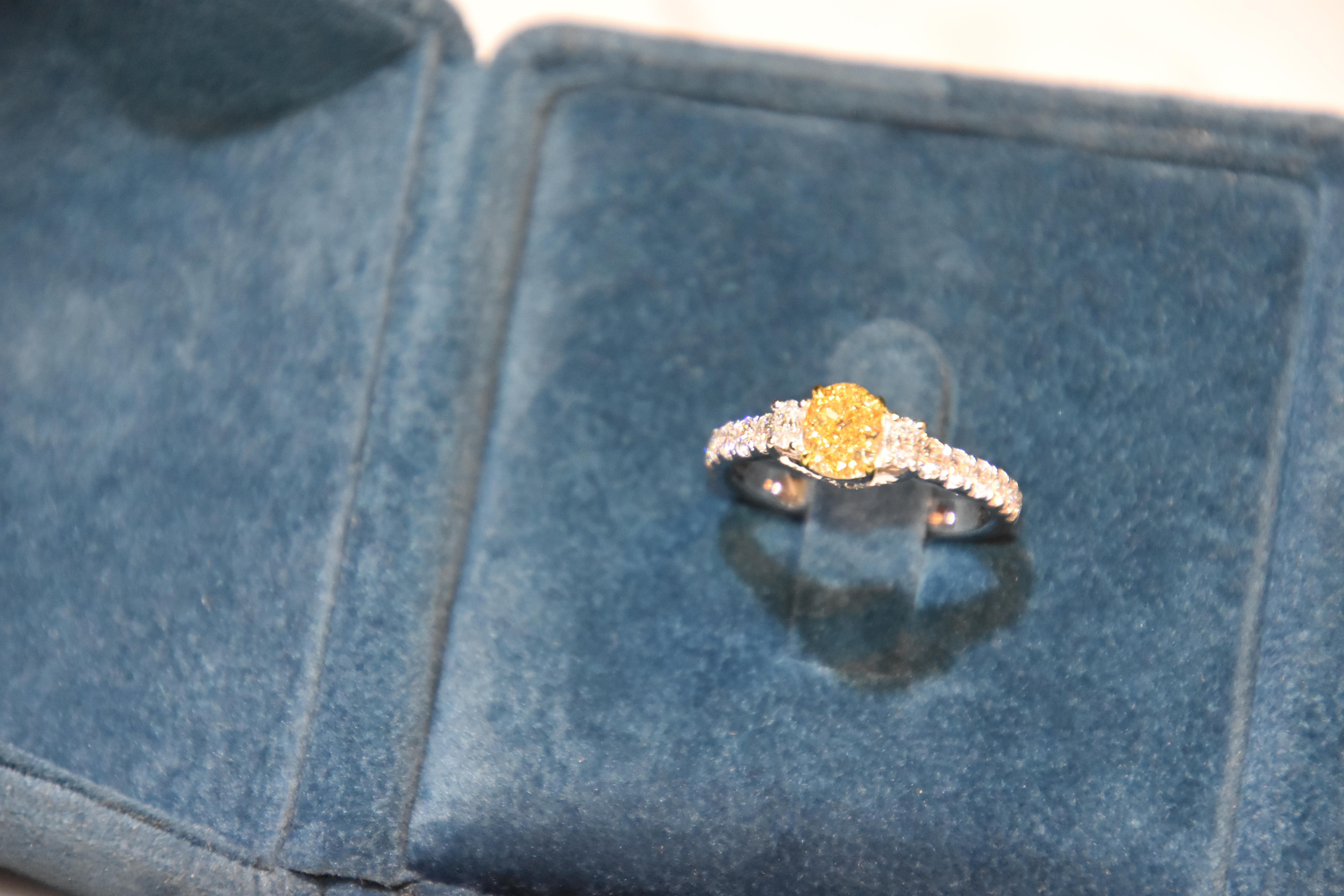 Women's GIA Certified 1.03 Carat Fancy Yellow VS1 3-Stone Diamond Ring For Sale