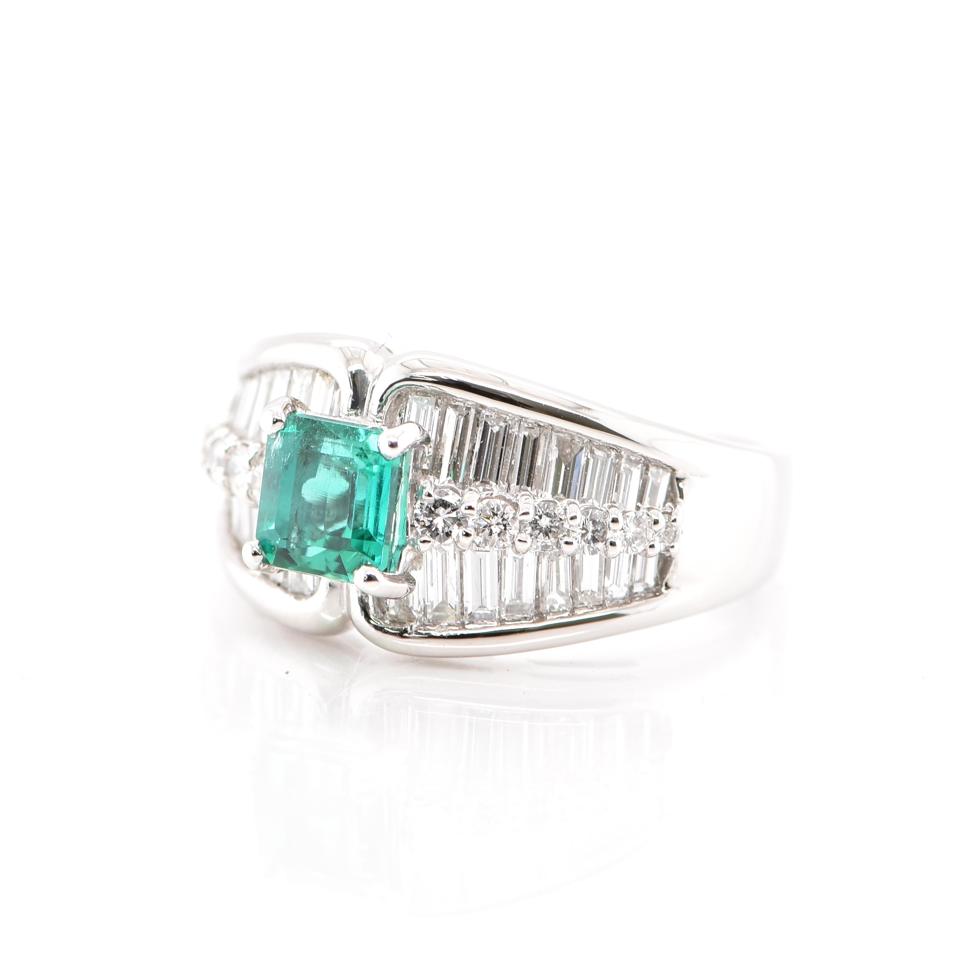 A stunning Cocktail Ring featuring a GIA Certified 1.03 Carat No Oil Colombian Emerald and 1.55 Carats of Diamond Accents set in Platinum. This Emerald is extremely rare as it is untreated whereas 95% of Emeralds in jewelry are clarity enhanced.