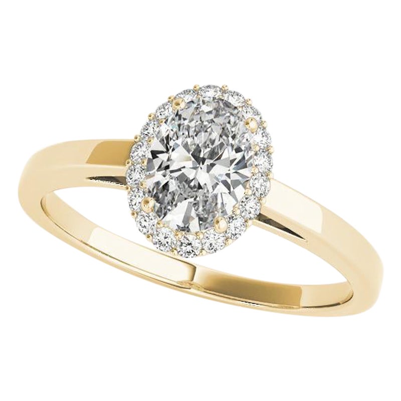 Anello con diamante aureolato ovale certificato GIA da 1,03 carati in oro giallo 18 carati