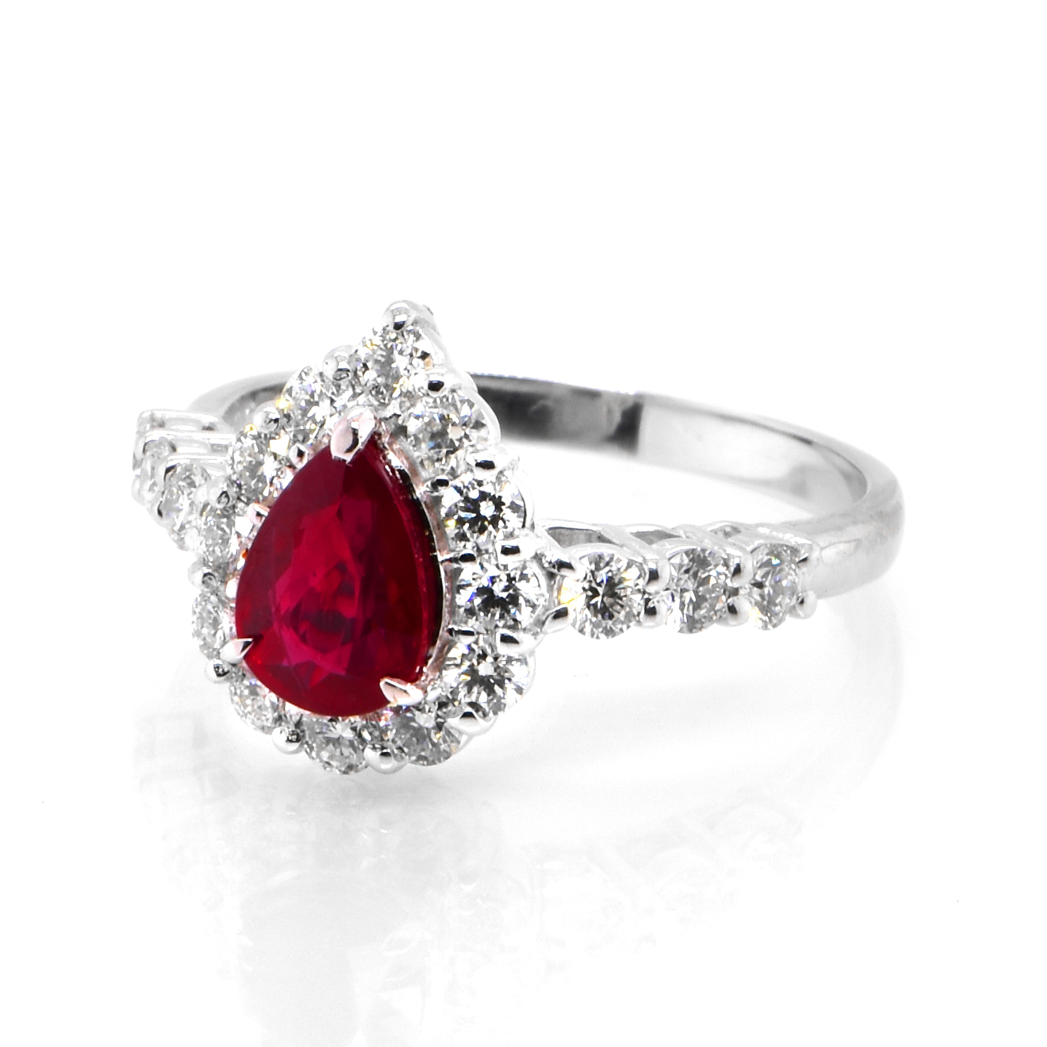 A beautiful Ring set in Platinum featuring a GIA Certified 1.03 Carat Natural, Pigeons Blood Red, Burmese Ruby and 0.68 Carat Diamonds. Rubies are referred to as 