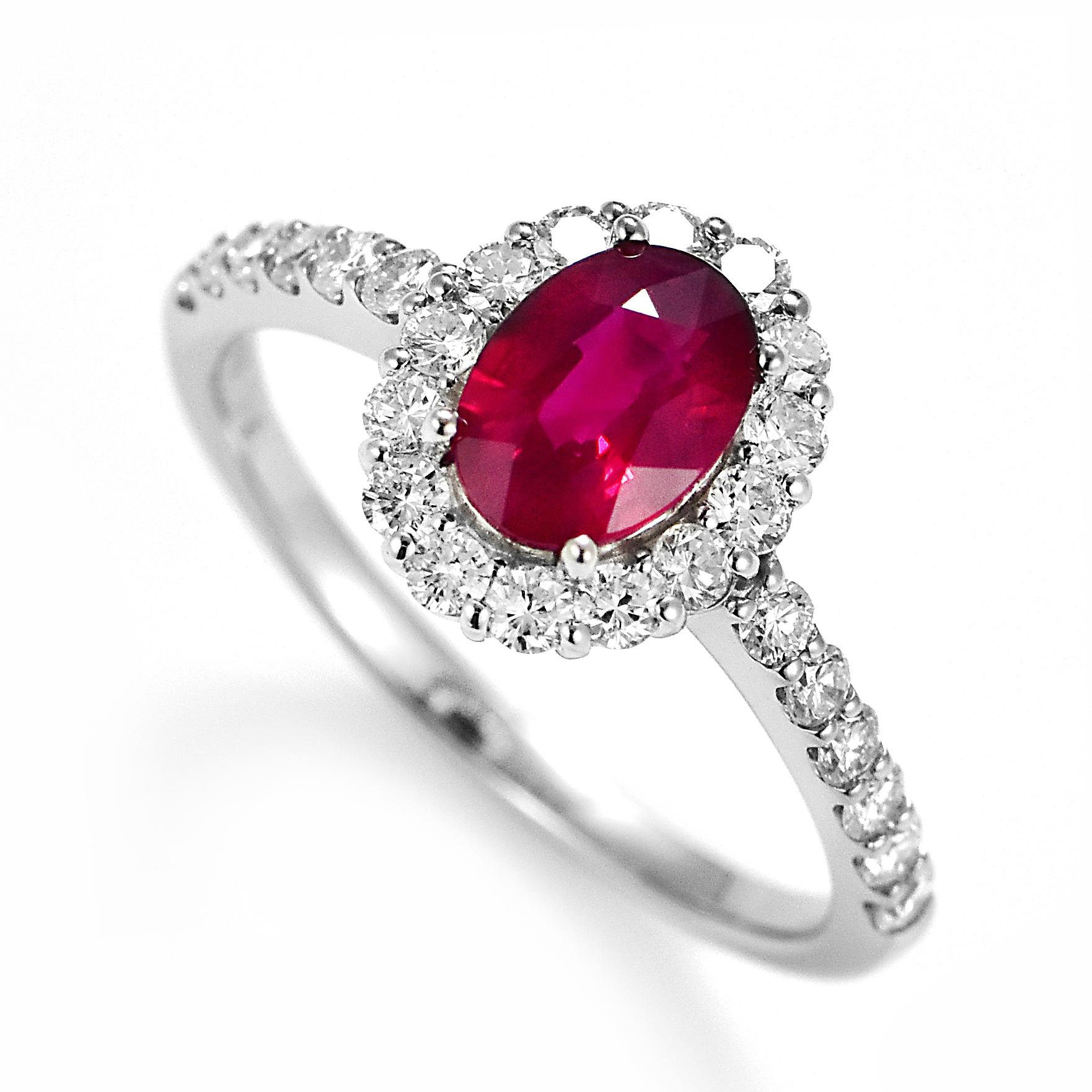 A beautiful Ring set in Platinum featuring a GIA Certified 1.03 Carat Natural Burmese Ruby and 0.54 Carat Diamonds. Rubies are referred to as 