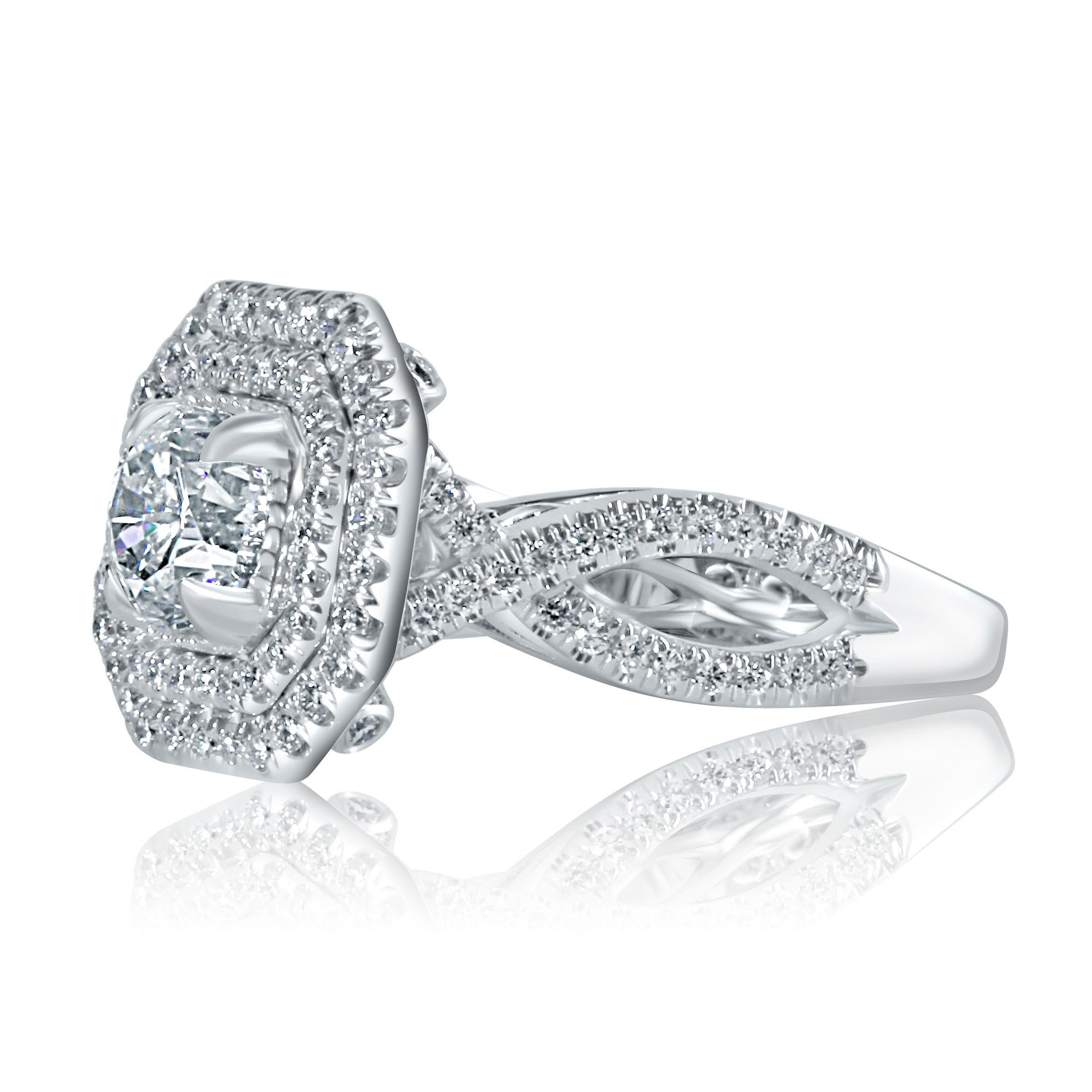 This exquisite diamond engagement ring showcases a breathtaking 1.03-carat GIA-certified round-cut diamond, featuring a G color and SI1 clarity, as verified by GIA report number 5172843550. The center stone, measuring 5.78 - 5.85 x 4.21 mm, radiates