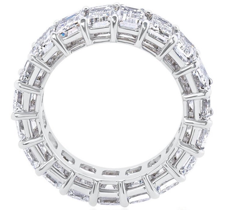 Exquisite emerald cut eternity band. 
17 individually GIA certified emerald cut diamonds weighing 10.33 carats ,make up this magnificent ring.
Diamonds are colorless (D E F) and clarity range of IF - VS1. precision cut and perfectly matched 
The
