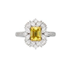 GIA Certified, 1.03ct Fancy Vivid Yellow Emerald Cut Solitaire Diamond ring 18KT