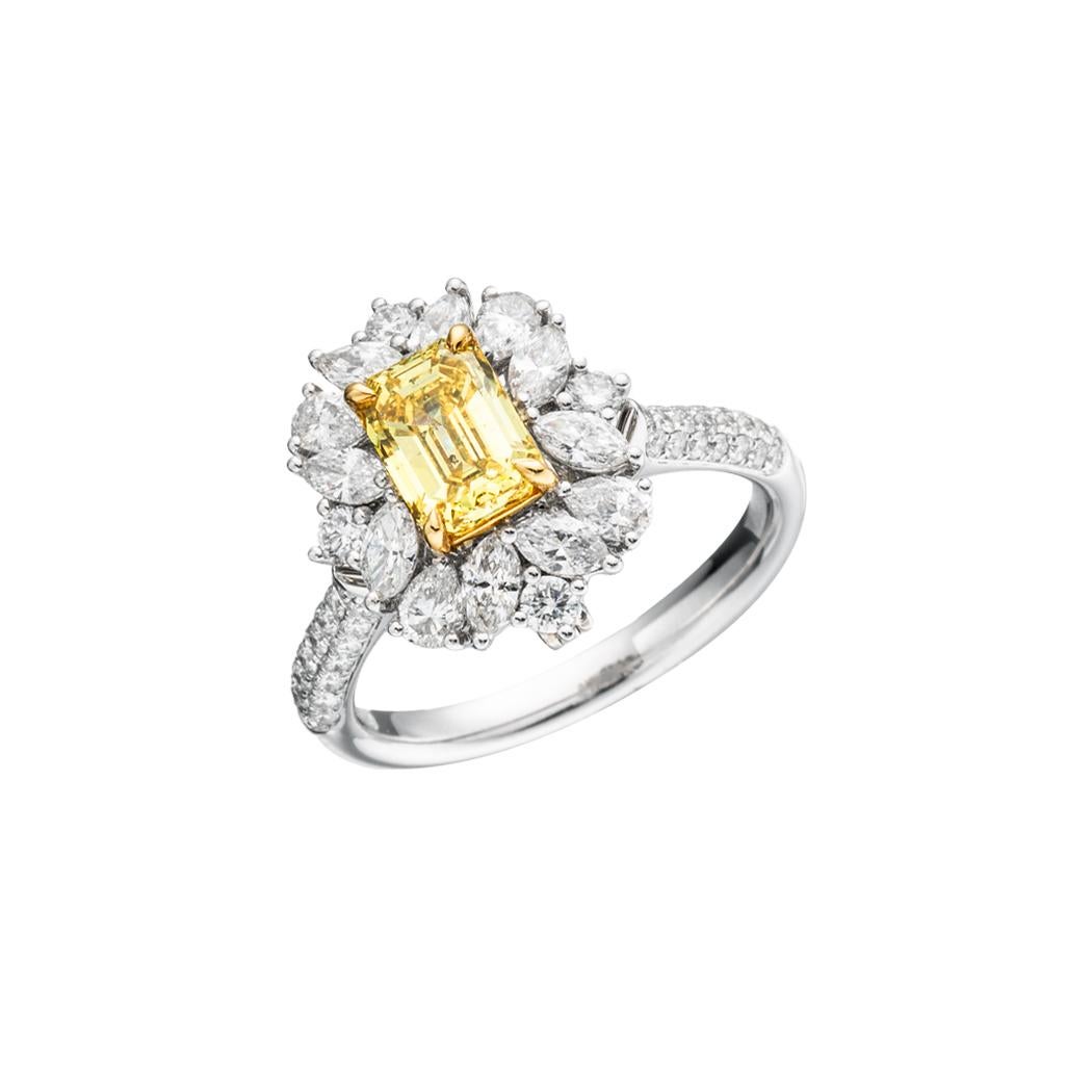 Contemporary GIA Certified, 1.03ct Fancy Vivid Yellow Emerald Cut Solitaire Diamond ring 18KT For Sale