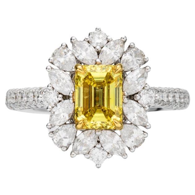 GIA Certified, 1.03ct Fancy Vivid Yellow Emerald Cut Solitaire Diamond ring 18KT For Sale