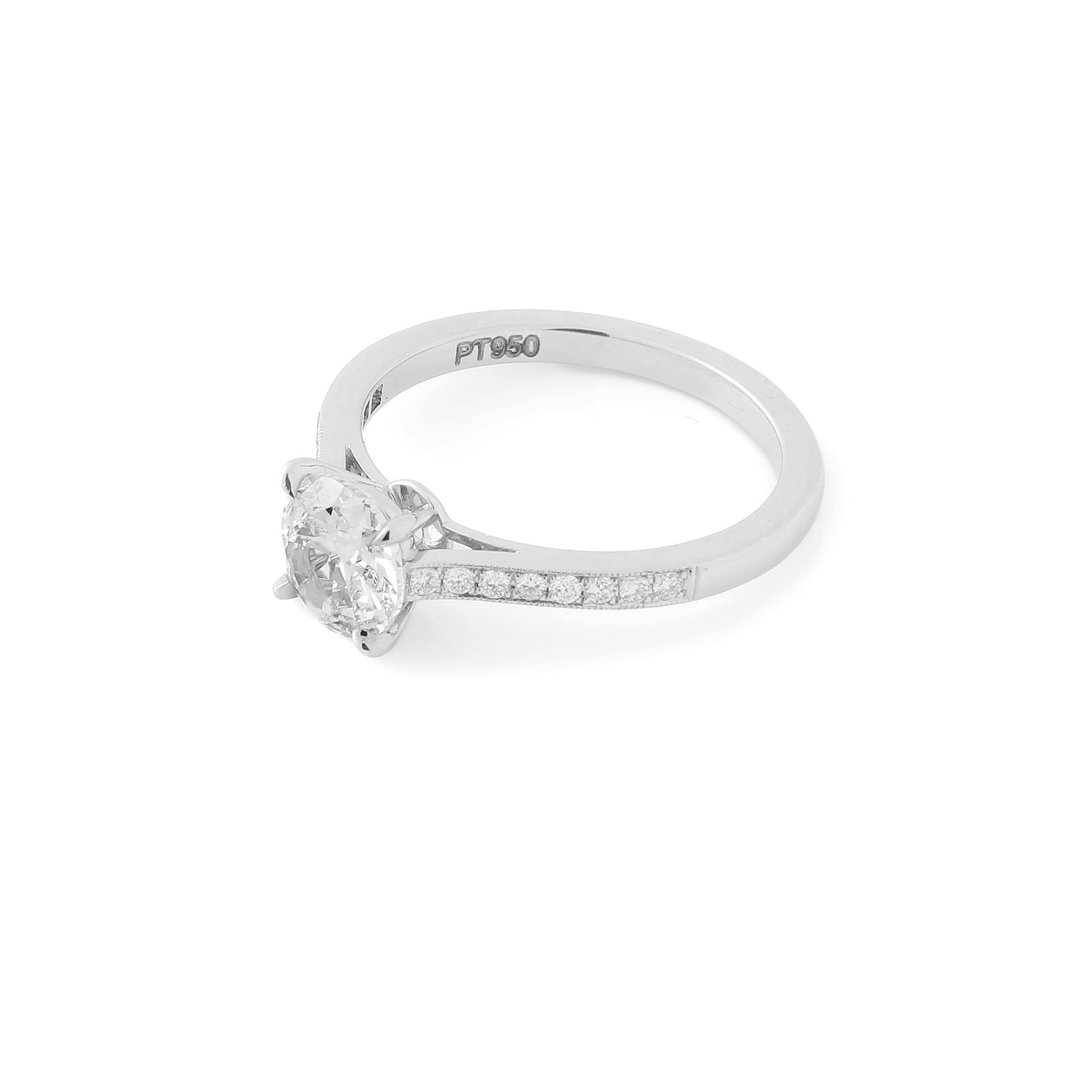 This timeless solitaire ring features a 1.04 carat F VS1 old cut round diamond, set in a classic pavé platinum mounting, made in the USA. 

Old cut diamonds like this one were cut by hand in earlier eras, often with less advanced technology and
