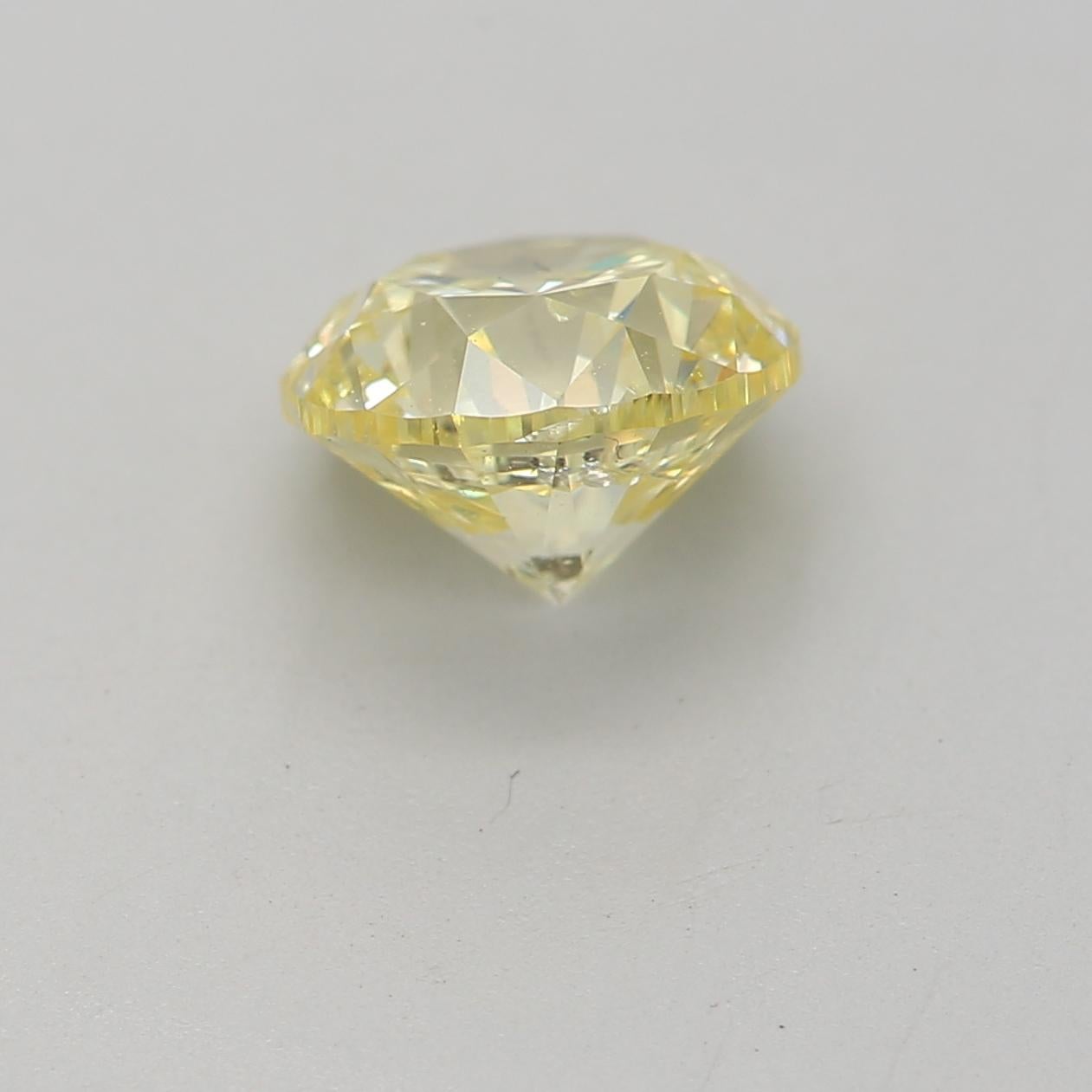 GIA Certified 1.04 Carat Fancy Light Yellow I2 Clarity Diamond In New Condition For Sale In บางรัก, TH