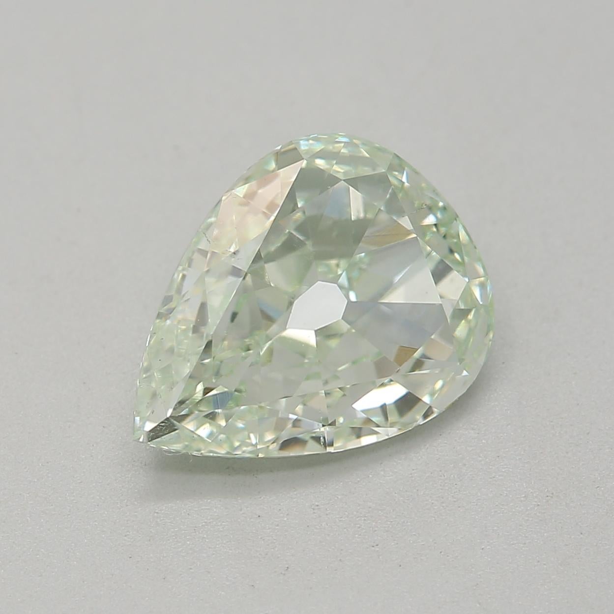 Certificate: GIA 
Report Number: 2374664617
Shape And Cut: Pear
Carat Weight: 1.04 carat
Measurements: 8.34 x 6.46 x 2.70 mm
Color Grade: Fancy Light Yellowish Green

FEATURES OF THE DIAMOND:

This fancy light yellowish green diamond is a rare and