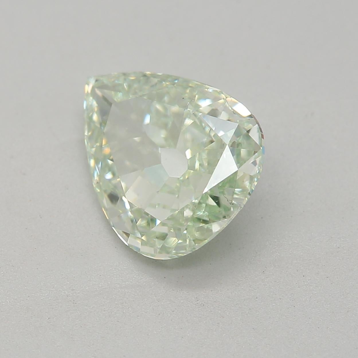Pear Cut GIA Certified 1.04 Carat Fancy Light Yellowish Green SI1 Clarity Diamond For Sale