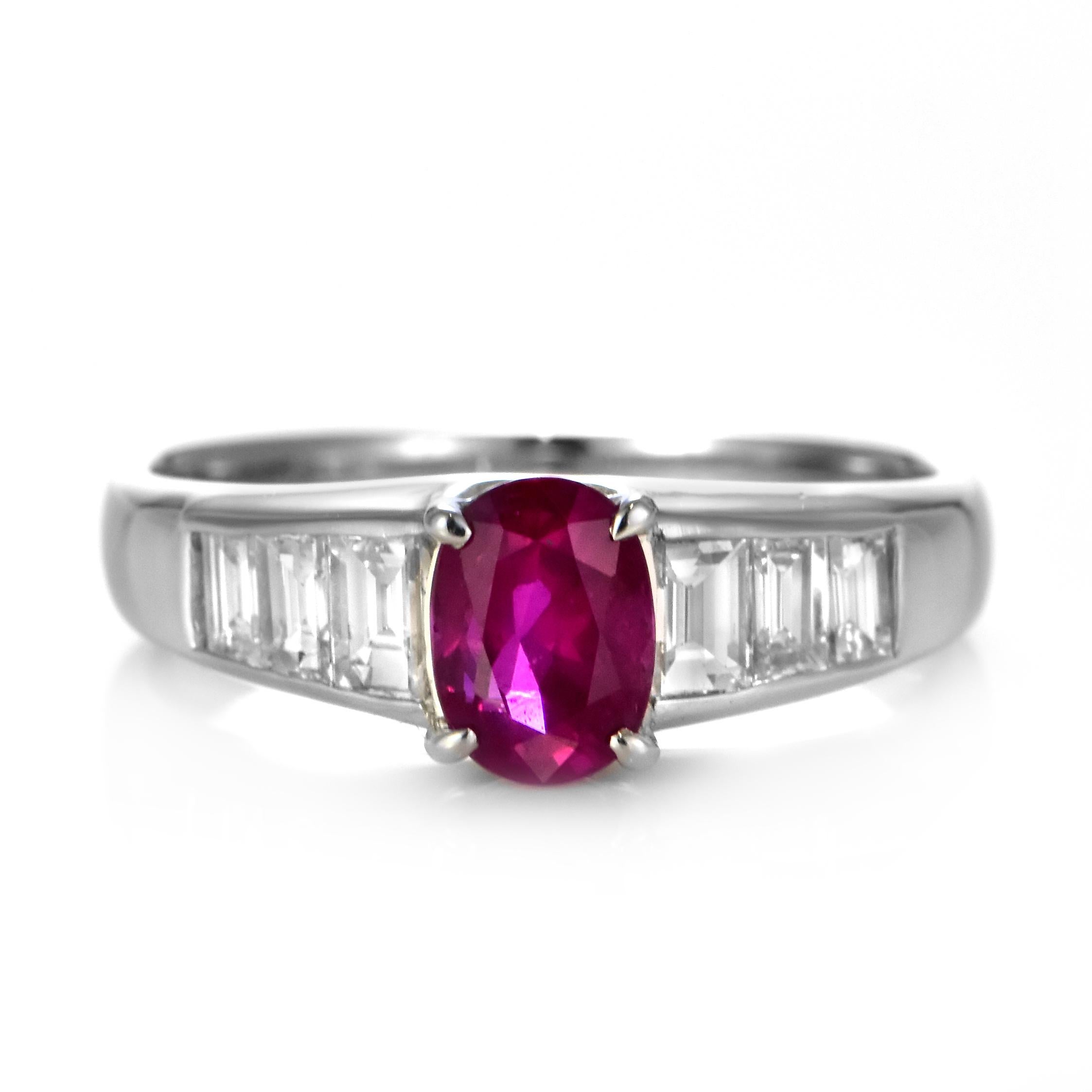 A beautiful Ring made in Platinum featuring a GIA Certified 1.04 Carat Natural No Heat Burmese Ruby and 0.535 Carat Diamonds. Rubies are referred to as 