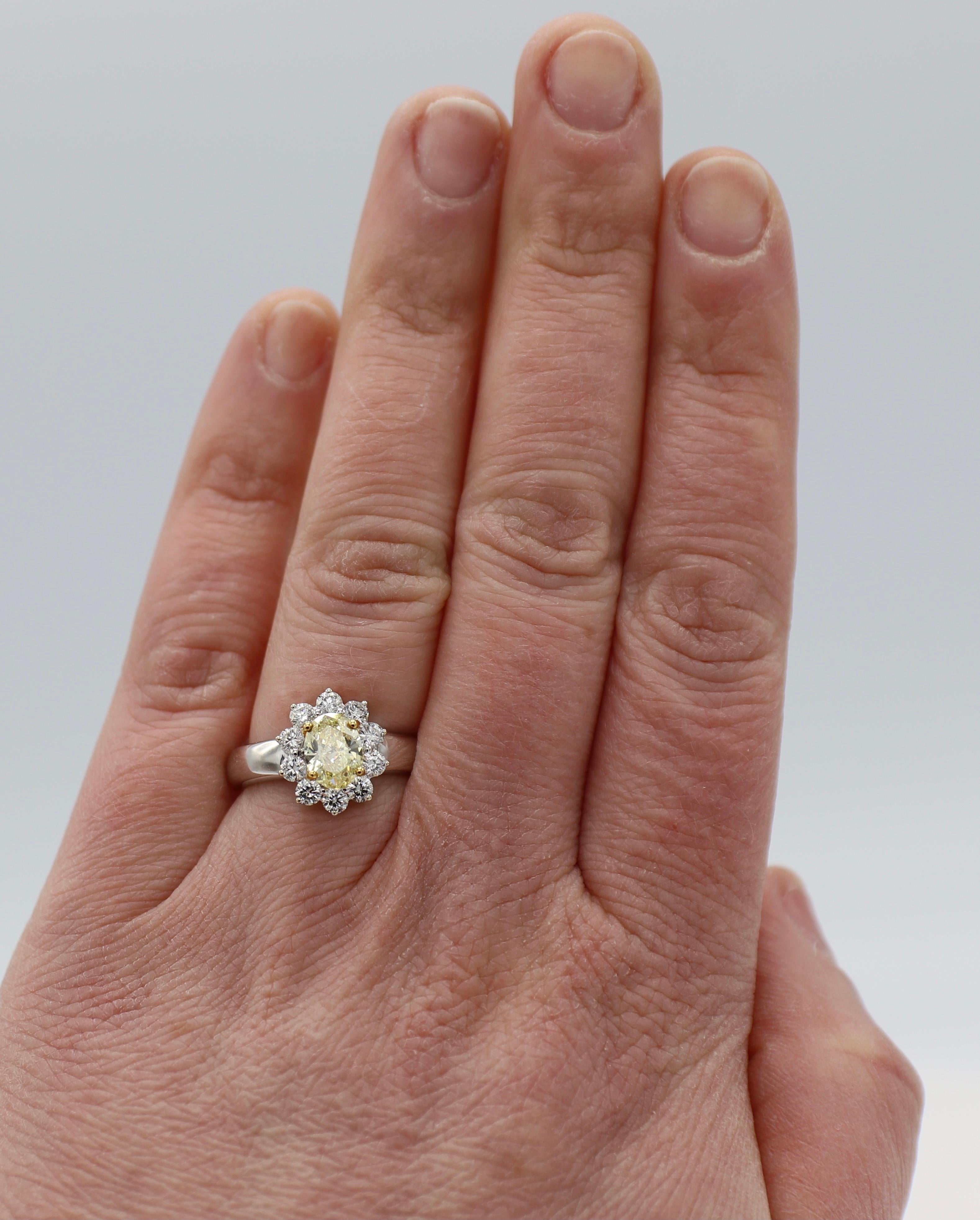 Women's GIA Certified 1.04 Carat Natural Fancy Intense Yellow Oval Diamond Ring