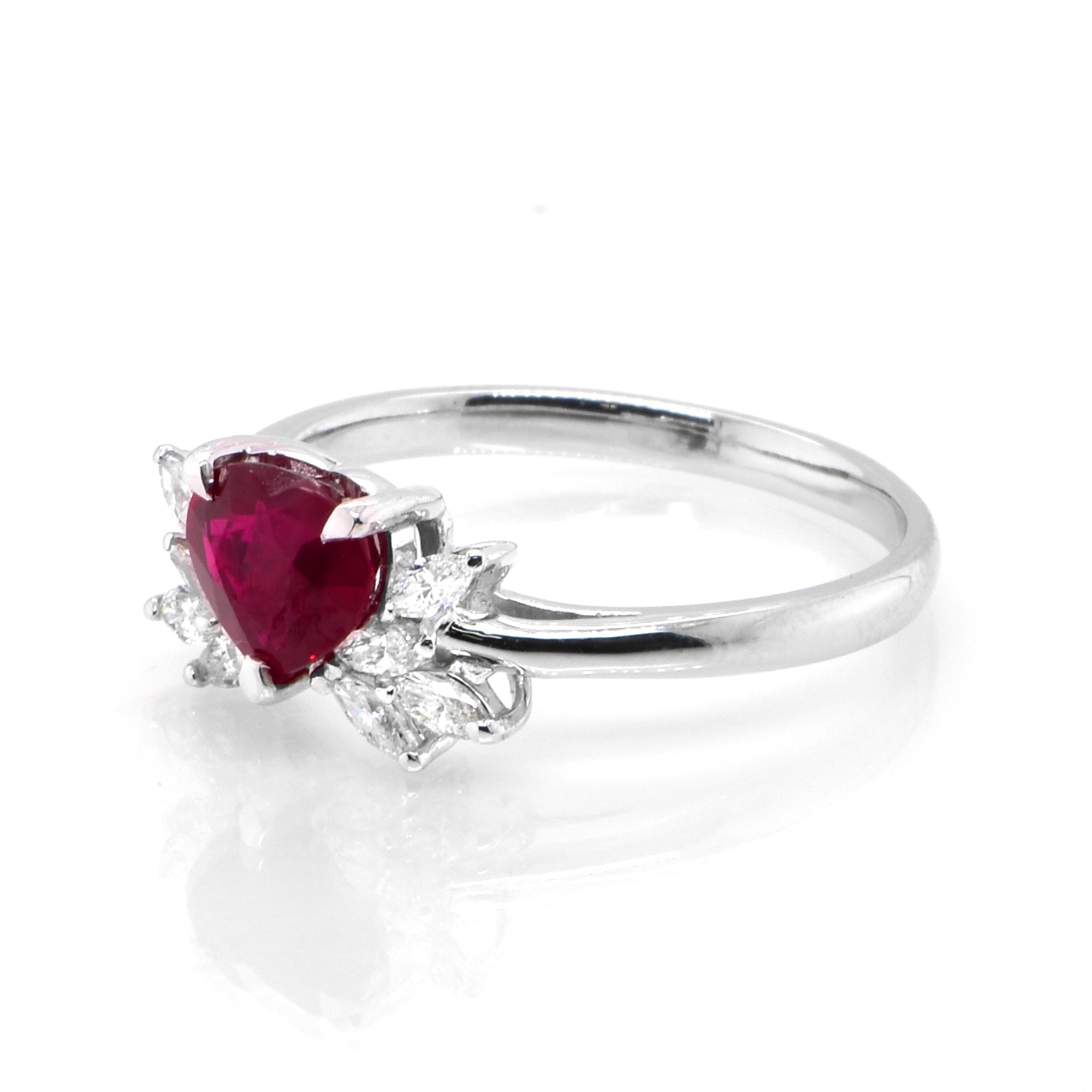 A beautiful Ring set in Platinum featuring a GIA Certified 1.04 Carat Natural, Pigeons Blood Red, Burmese Ruby and 0.25 Carat Diamonds. Rubies are referred to as 