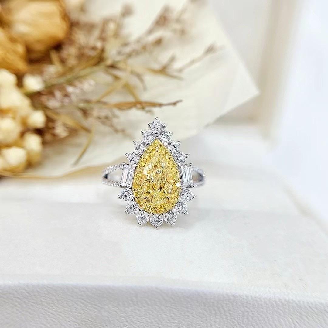 GIA Certified 1.04 CT Fancy Light Yellow Diamond Ring & Pendant with Diamonds

1 Fancy Light Yellow Diamonds - 1.04 CT
Clarity Grade: VS2 
Shape: Pear

Diamonds - 1.12 CT
Total Weight: 5.29 GM

Ring / Pendant