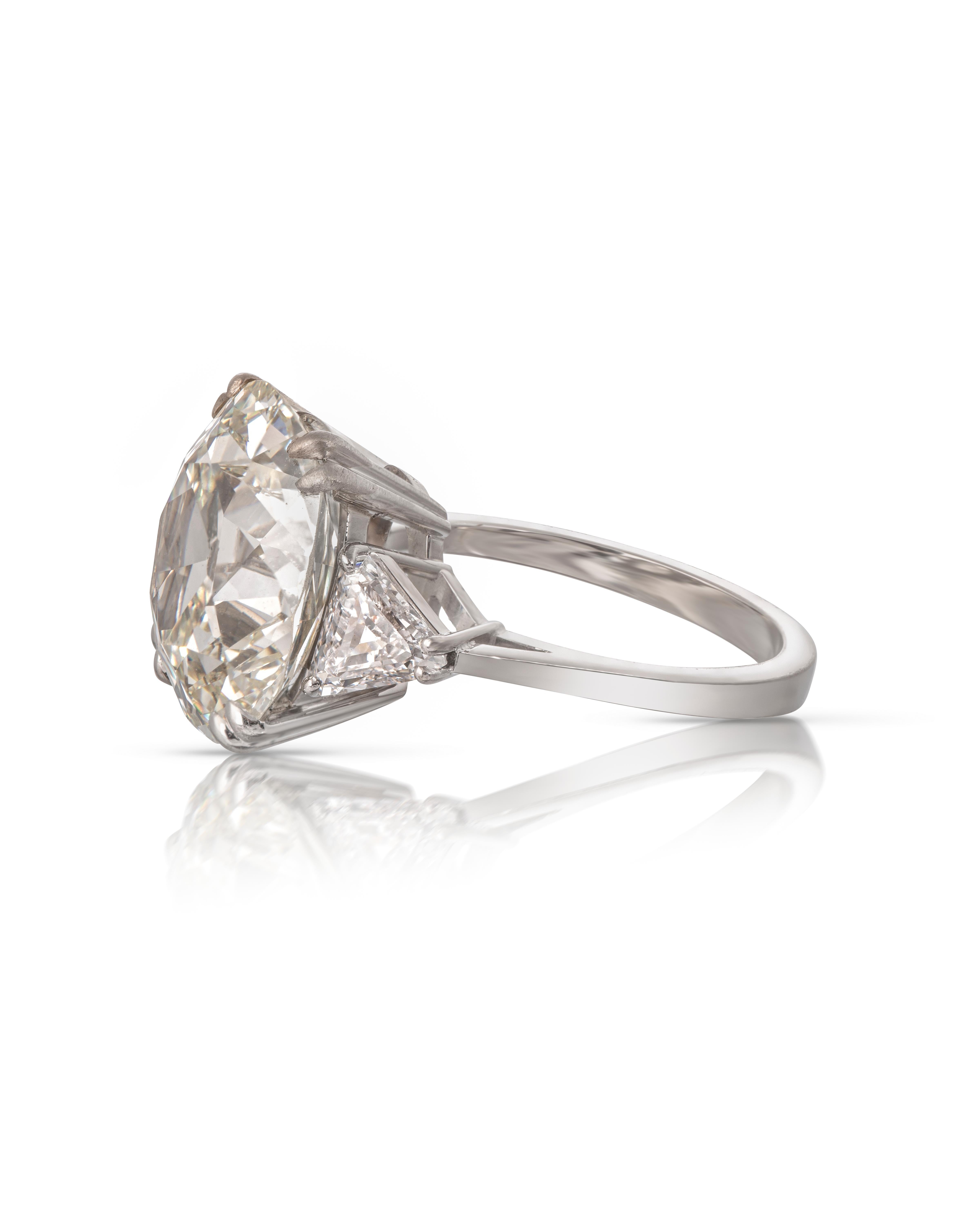 GIA Certified 10.45 carat Cushion Cut Diamond Ring
This gorgeous and unique antique cushion brilliant cut diamond of 10.45 carats is L colour and Si1 clarity as graded by the GIA. The main stone is set in a hand made platinum setting with a