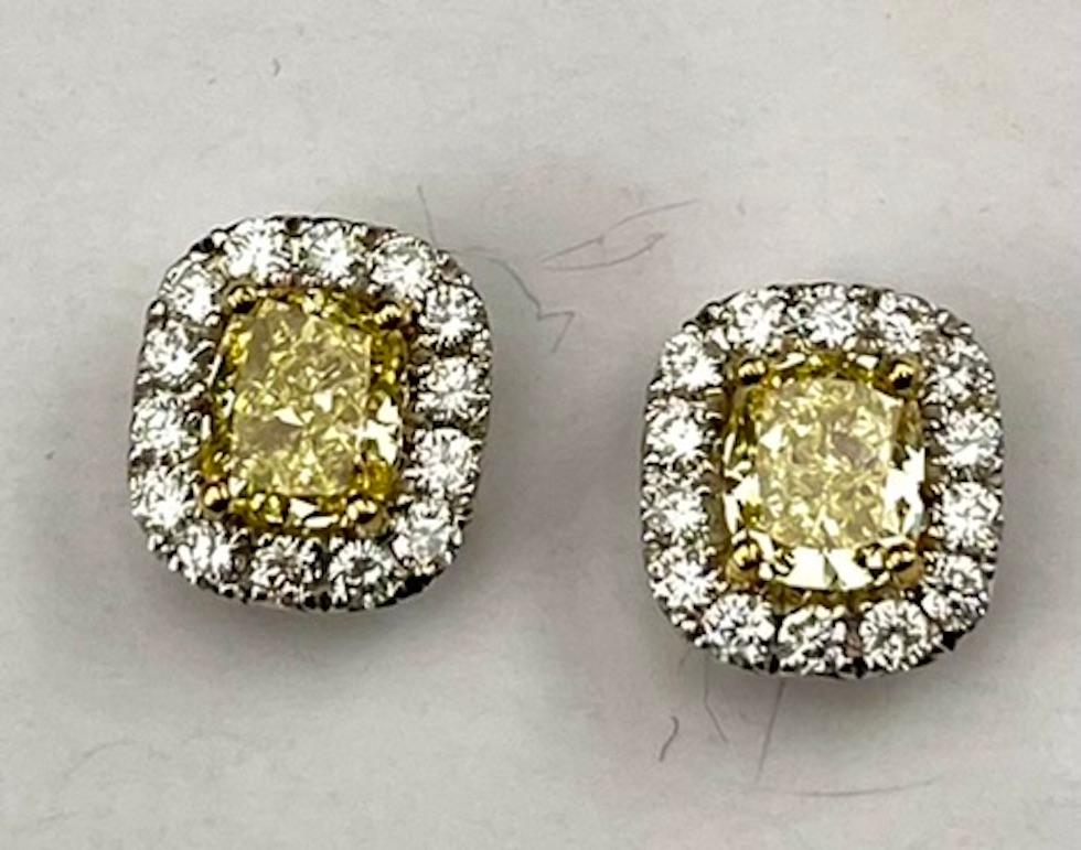 GIA Certified 1.04Ct and 1.03Ct Radiant Natural Fancy Yellow Diamond Earrings In New Condition For Sale In San Diego, CA