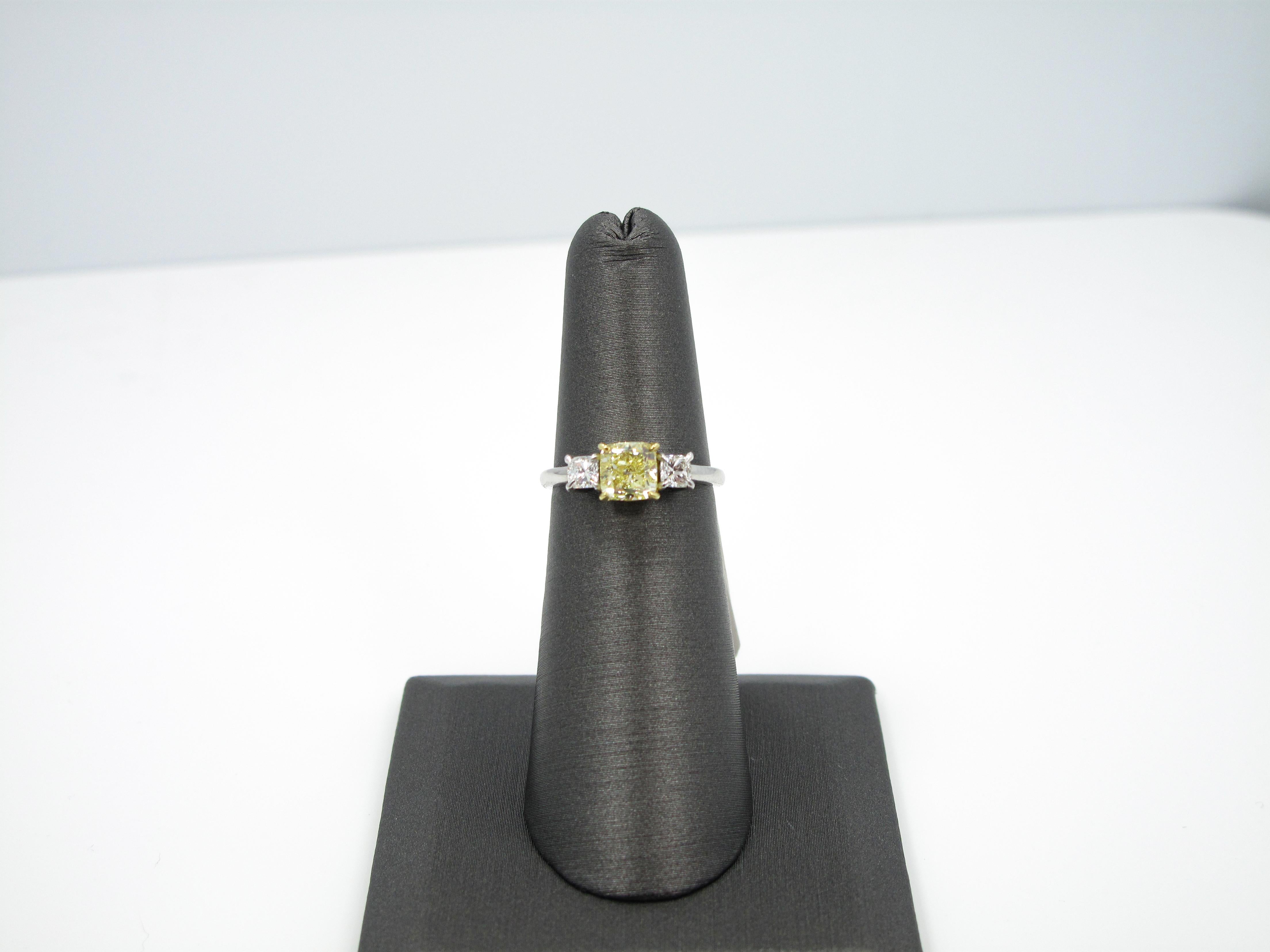 Cushion Cut GIA Certified 1.04 Carat Fancy Yellow Diamond Three-Stone Ring For Sale
