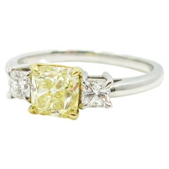 GIA Certified 1.04 Carat Fancy Yellow Diamond Three-Stone Ring
