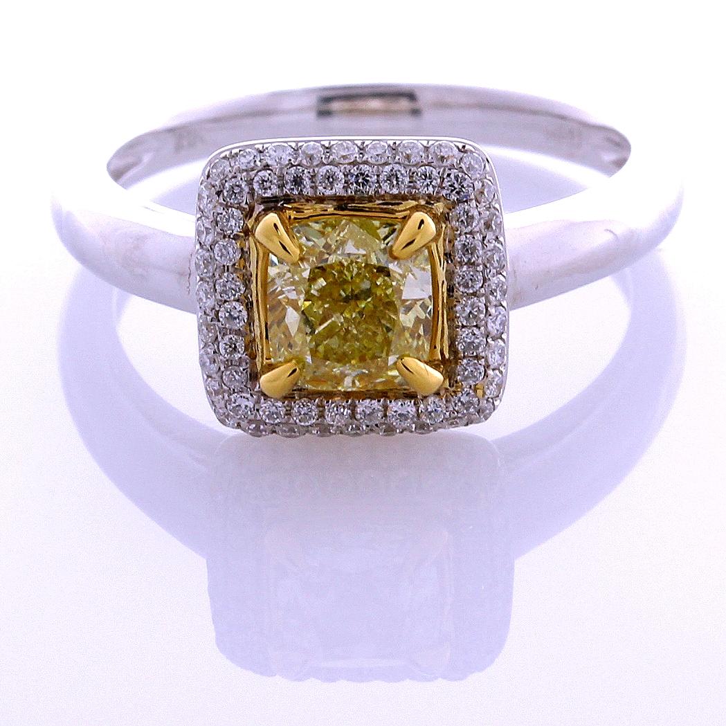 Incredible Deal on GIA Certified 1.05 Carat Cushion Cut, Natural Fancy Light Yellow Even, Diamond Ring, SI1 clarity, measuring 5.72-5.37x3.77. Total Carat Weight on the ring is 1.30.
GIA CERTIFICATE #2267124529. 
This Classic mounting is fashioned