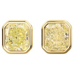 GIA Certified 10.52 Carat Fancy Light Yellow Diamond 18K Gold Bezel Stud Earring