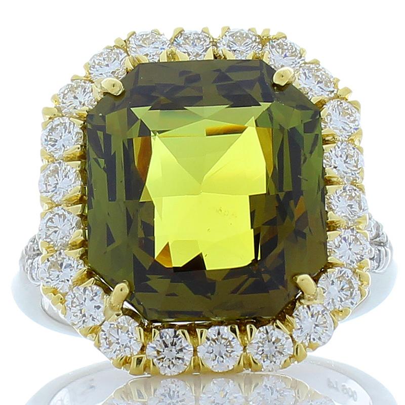 Your Alexandrite search is over. The 10.55 carat Alexandrite is one of the most important gems in our collection. It's GIA certified, measures 12.44 x 11.75 mm, and octagonal. This gem source is Russia. It exhibits a brilliant olive green body with
