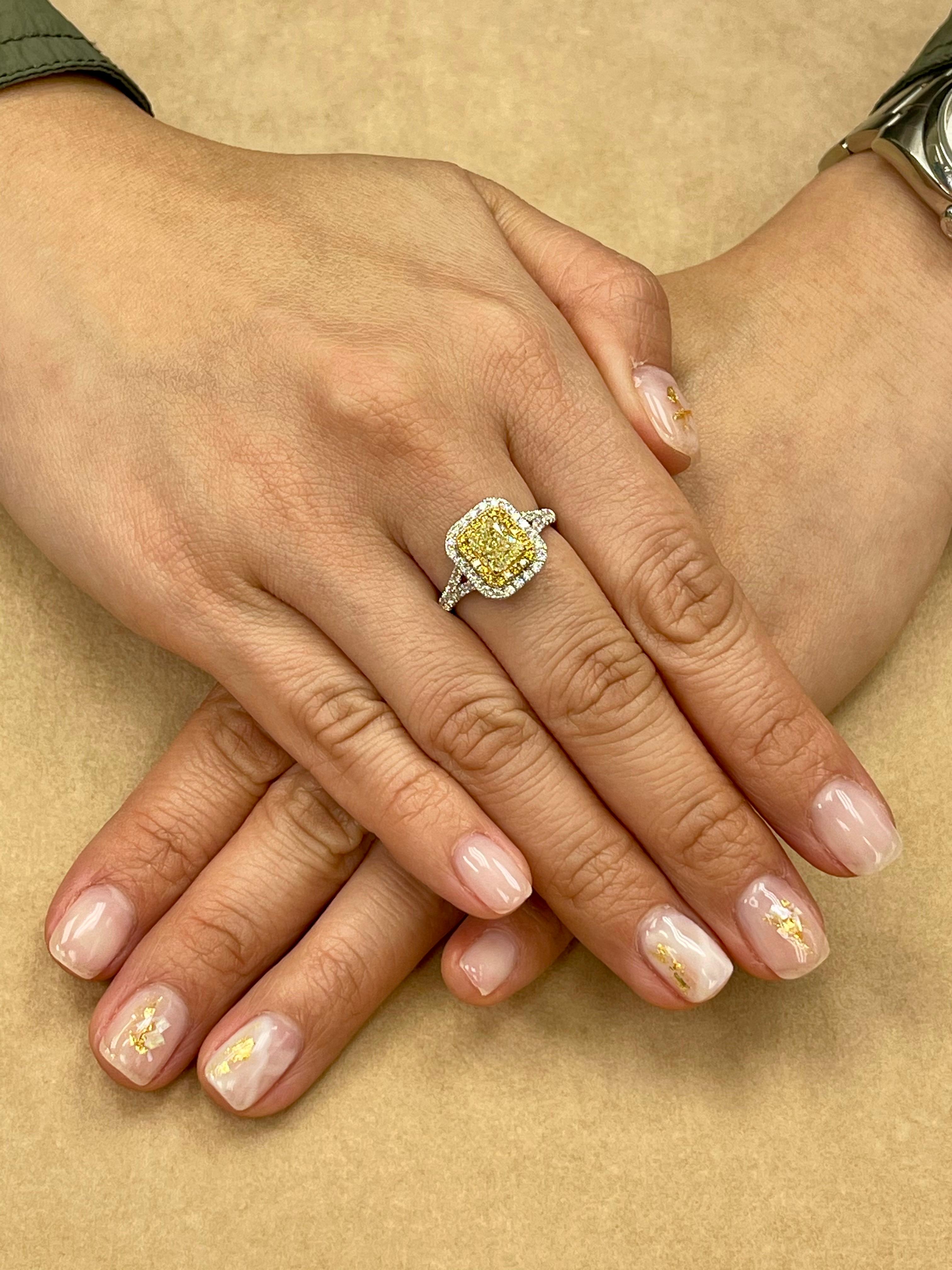 Here is a classic double halo ring made with very colorful stones. This cocktail ring is set in 18k white gold. The center natural diamond (6.1mm x 5.1mm) is GIA certified and graded W to X range in color (the actual ring looks like fancy intense
