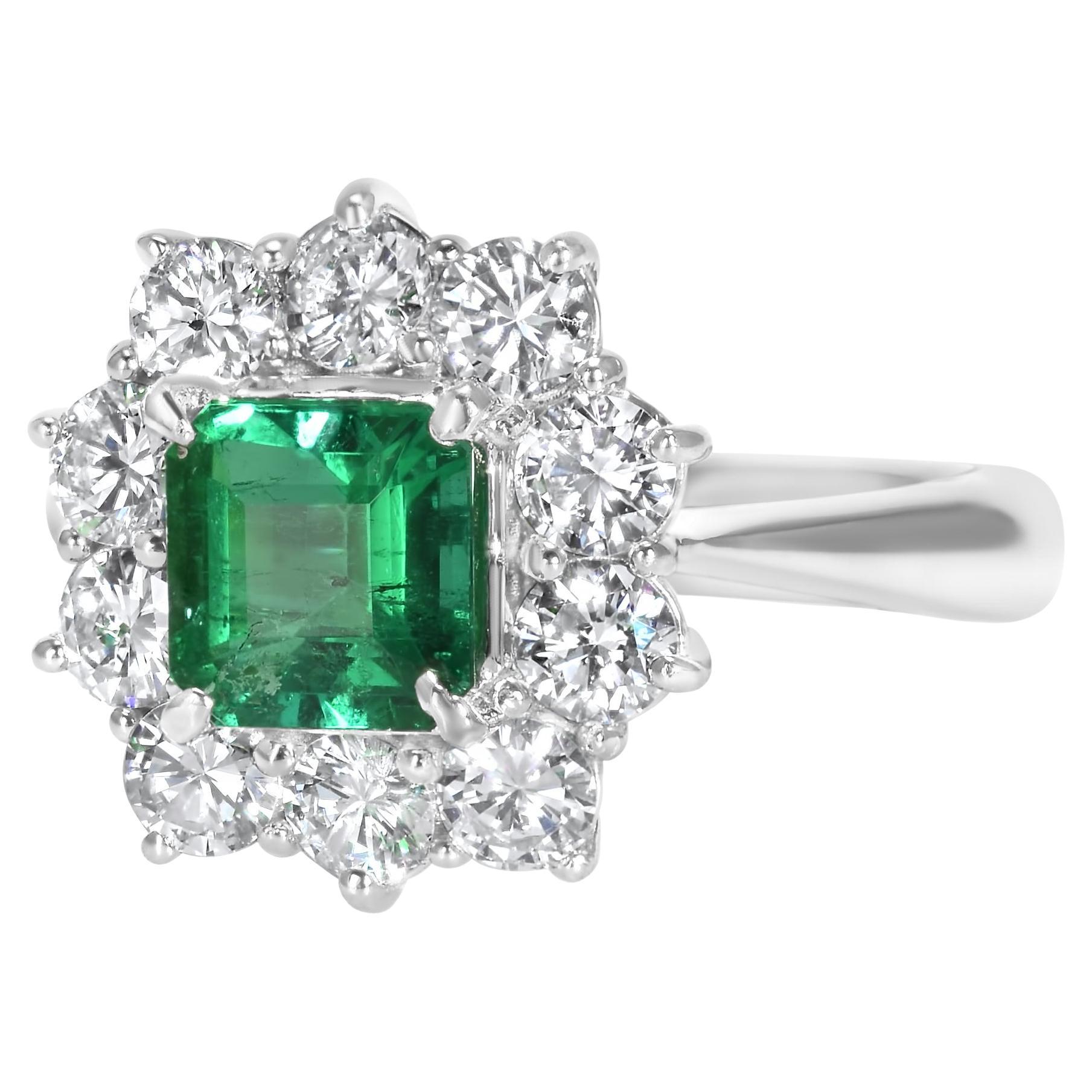 GIA Certified 1.06 Carat Colombian Emerald and Diamond Halo Ring in Platinum