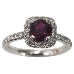 Anillo de oro de 14 quilates con halo de diamantes y rubíes ovalados con certificado GIA de 1,06 quilates de rubí en cojín