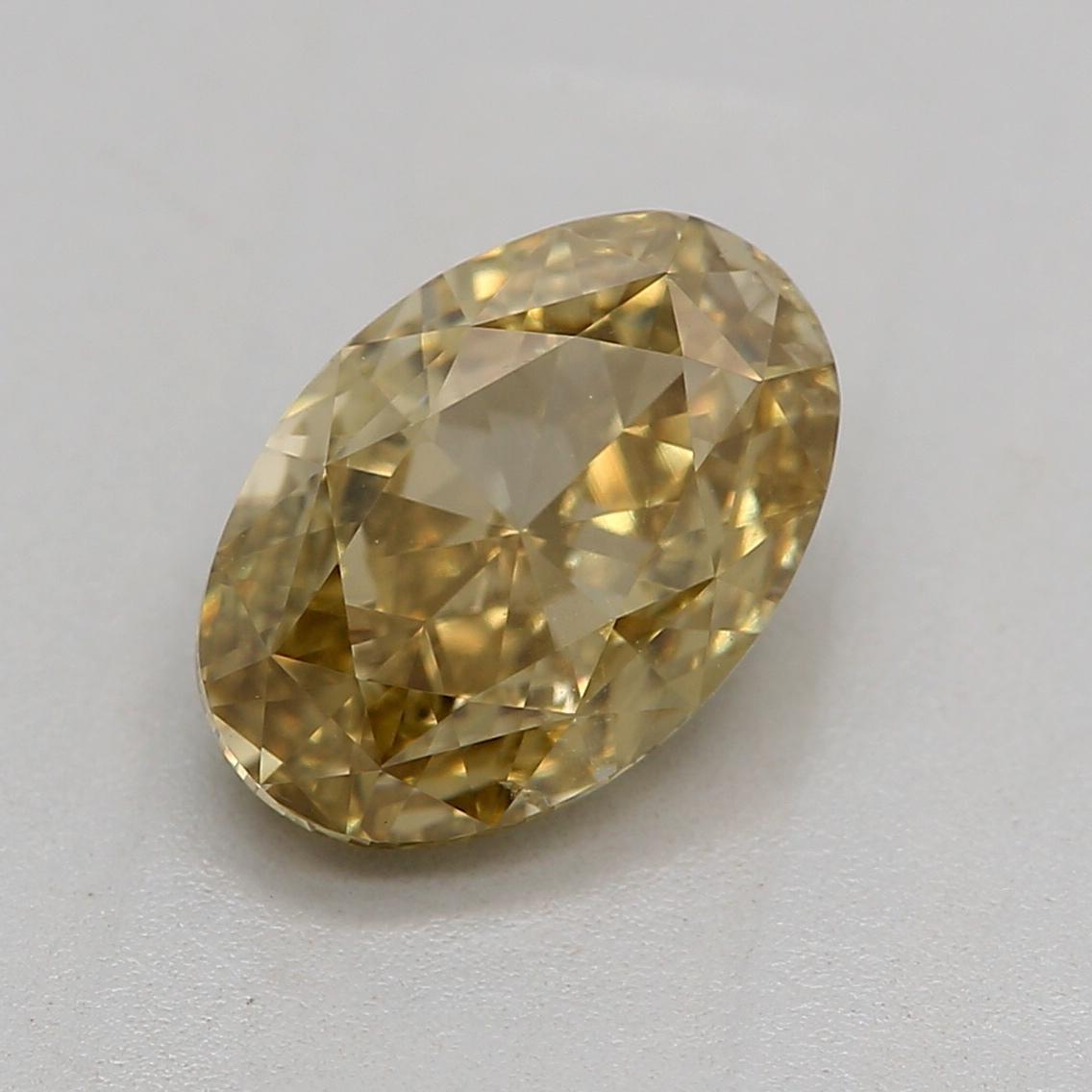 Certificate: GIA 
Report Number: 2466188722
Shape And Cut: Oval
Carat Weight: 1.06 carat
Measurements:  7.51 x 5.12 x 3.37 mm
Color Grade: Fancy Deep Brownish Greenish Yellow

FEATURES OF THE DIAMOND:

This Fancy Deep Brownish Greenish Yellow