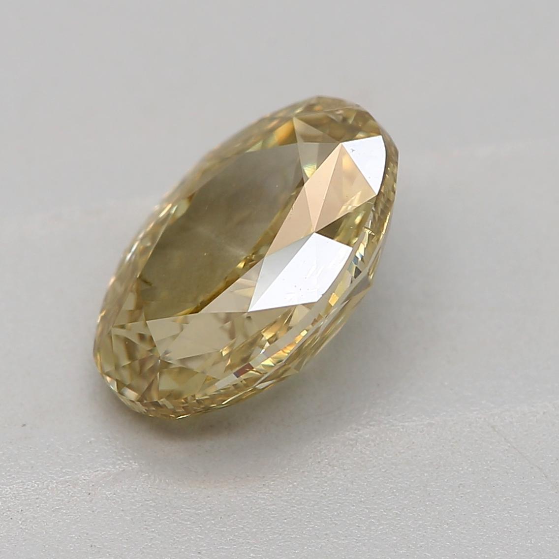 Oval Cut GIA Certified 1.06 Carat Fancy Deep Brownish Greenish Yellow SI1 Clarity Diamond For Sale