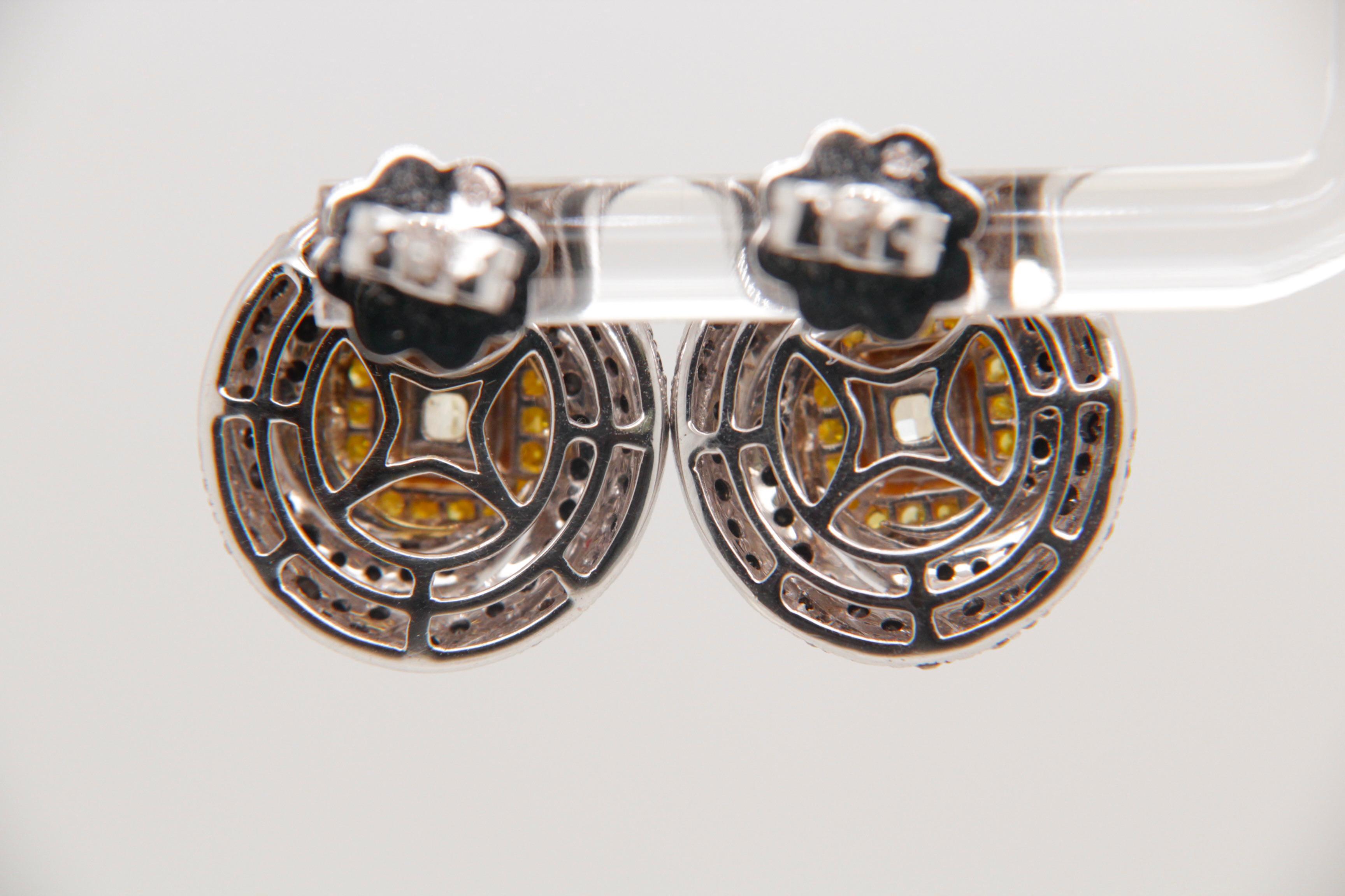 GIA Certified 1.06 carat Fancy Yellow and Black Diamond Spiral Stud Earrings In New Condition For Sale In Bangkok, TH