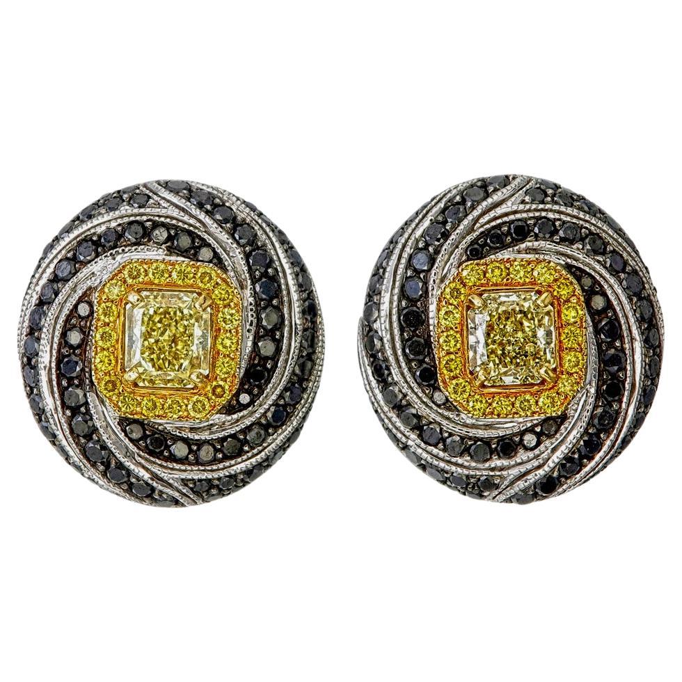 GIA Certified 1.06 carat Fancy Yellow and Black Diamond Spiral Stud Earrings For Sale