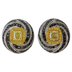 GIA Certified 1.06 carat Fancy Yellow and Black Diamond Spiral Stud Earrings