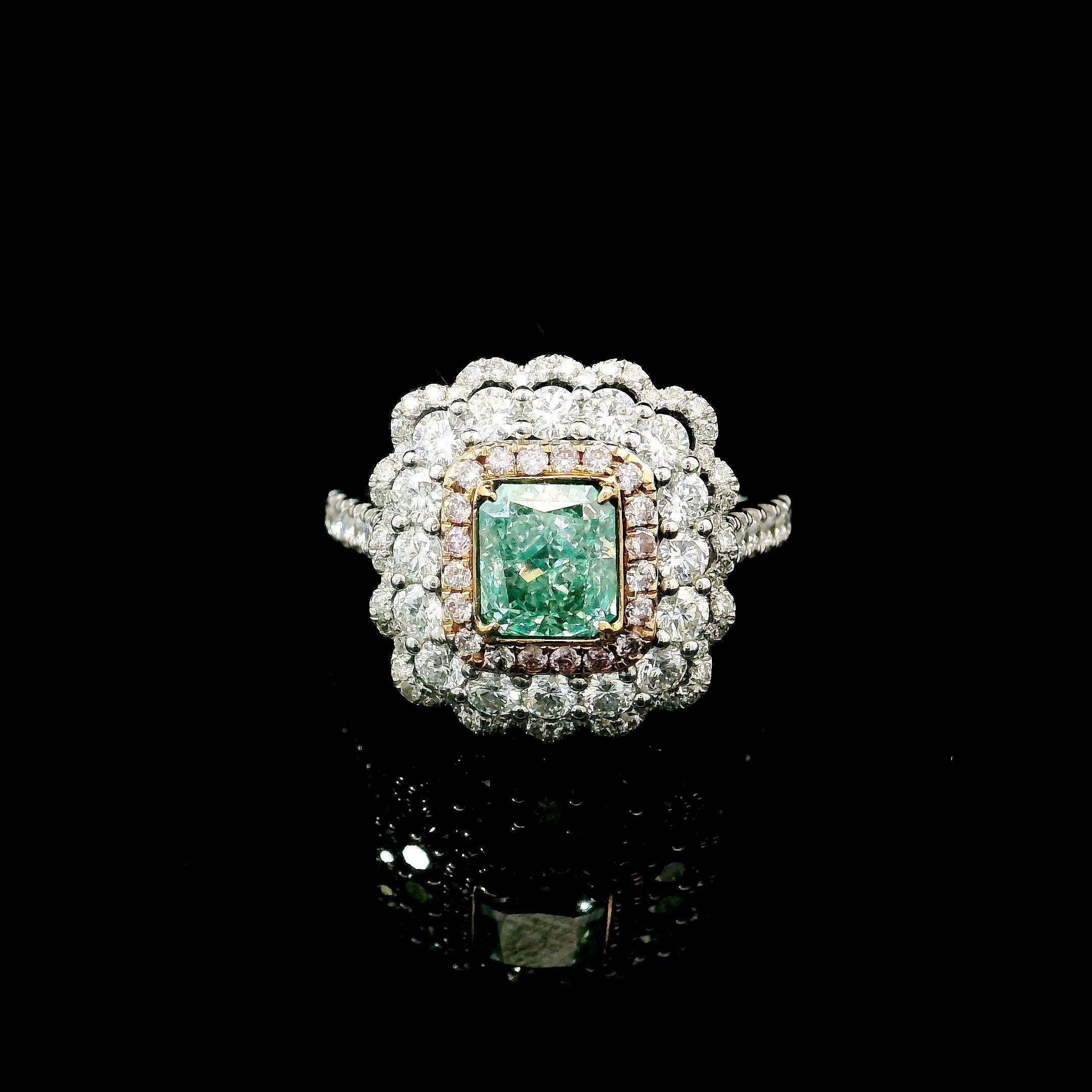 18kt white gold ring with diamonds
  
  Gold colour & karat: White gold 18kt
  Weight: 6.025 grams
  
  Set with-
  Stone type: Diamonds
  Shape: Radiant
  Carat: 1.06 ct
  Colour: Fancy Yellow Green
  Clarity: VS2
  
  Surrounding Stones: Diamonds
